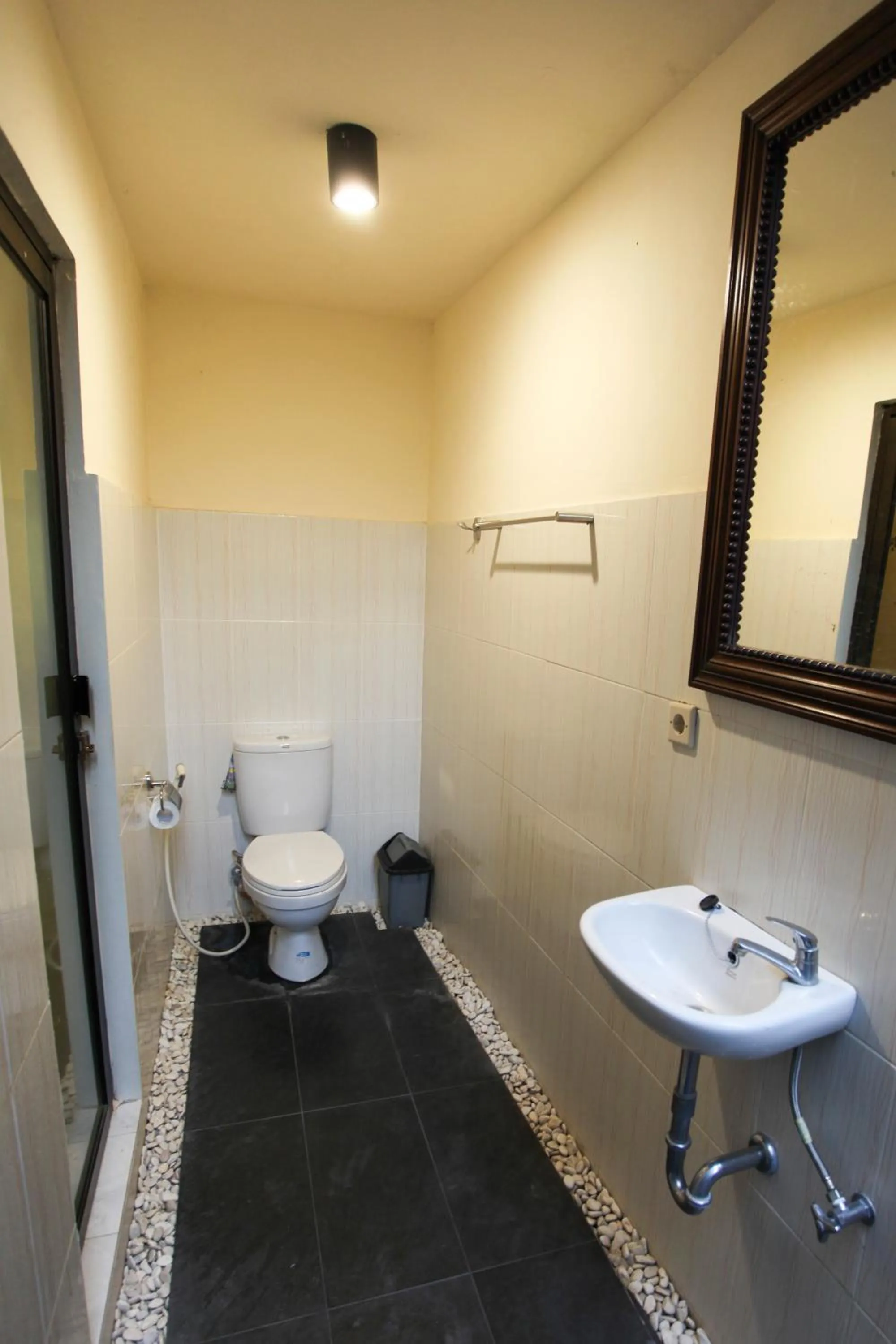 Toilet in KUDESA Homestay by Pramana Villas
