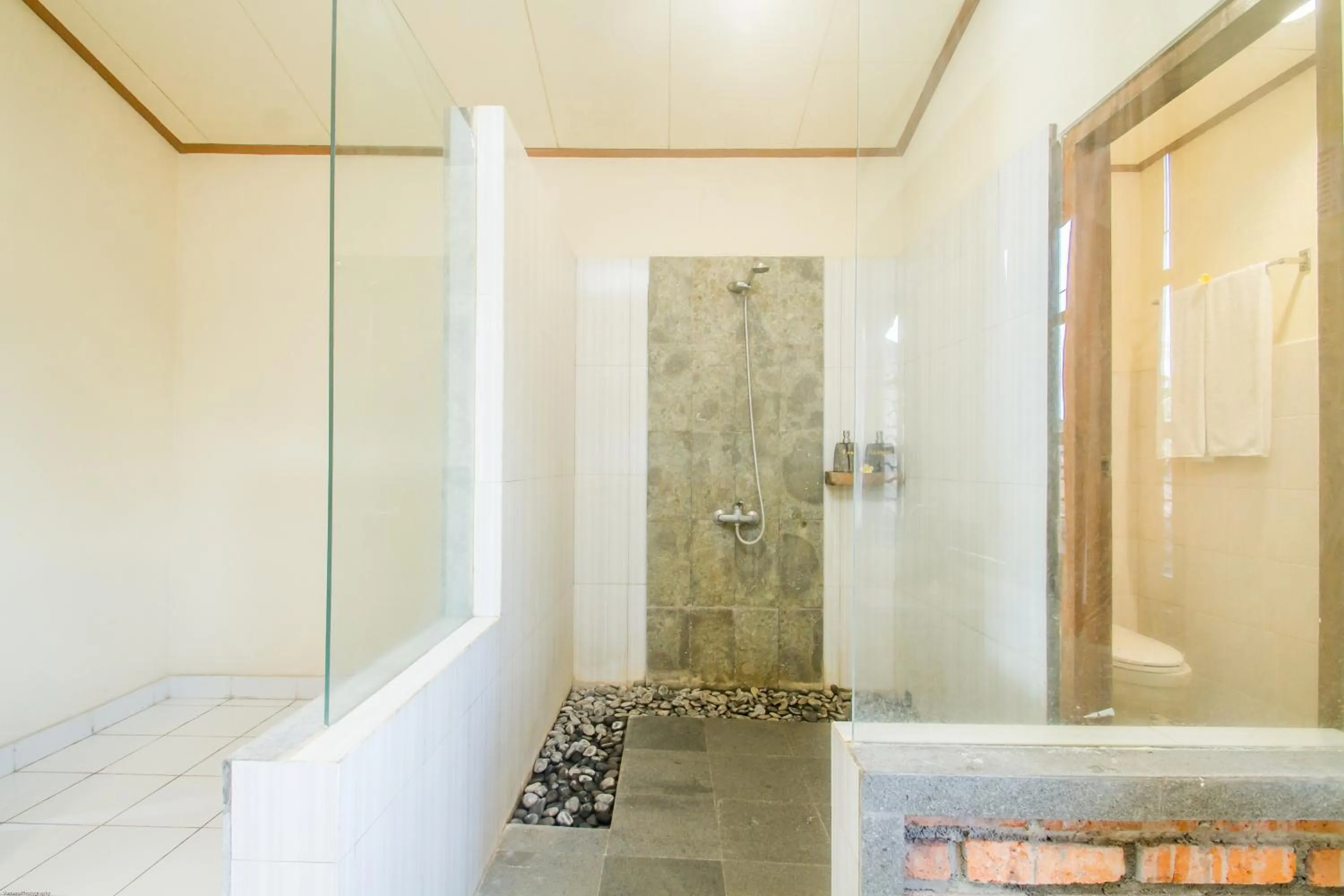 Shower in KUDESA Homestay by Pramana Villas
