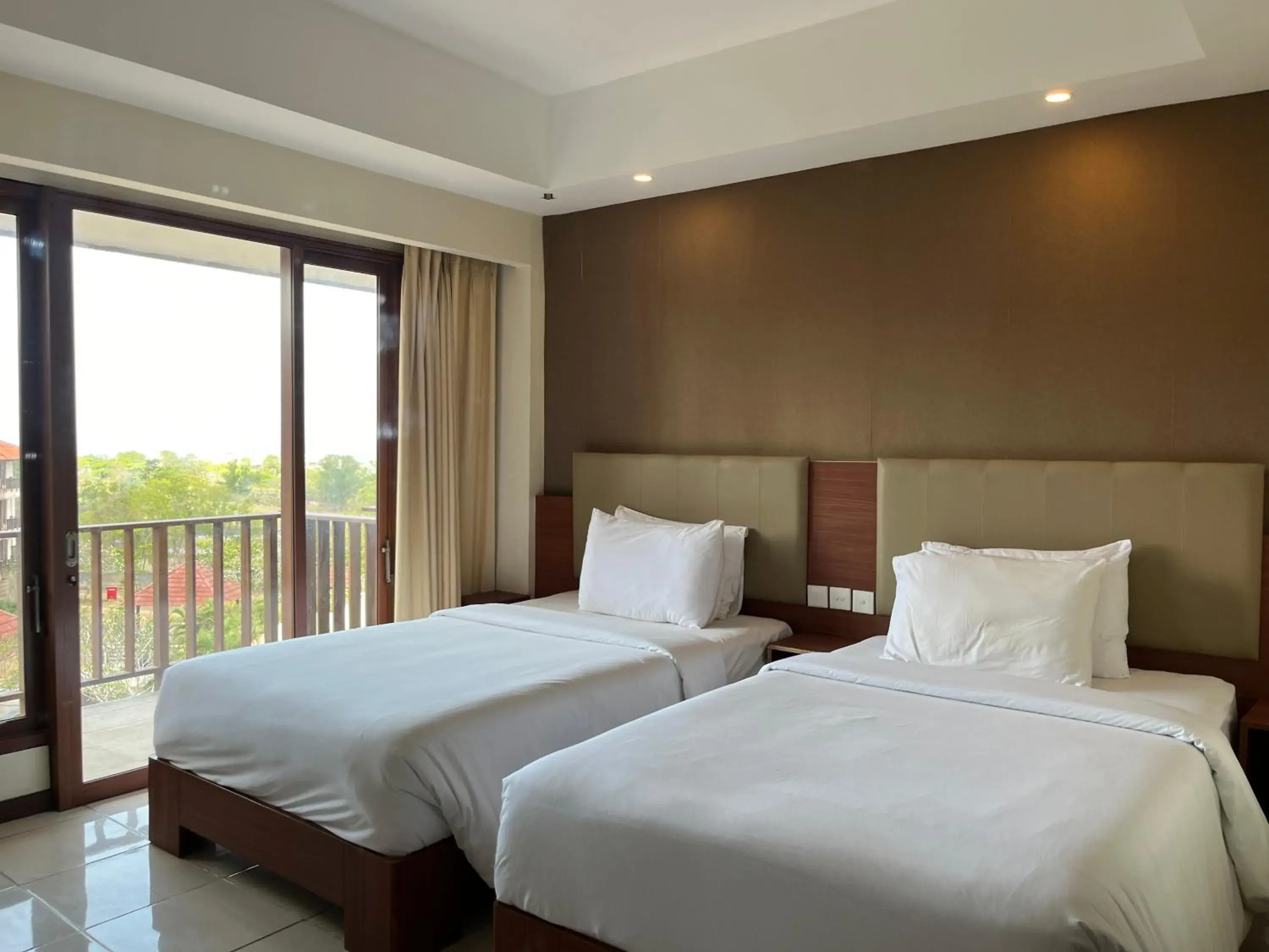 Bed in New Kuta Hotel by LORIN Bed in New Kuta Hotel by LORIN