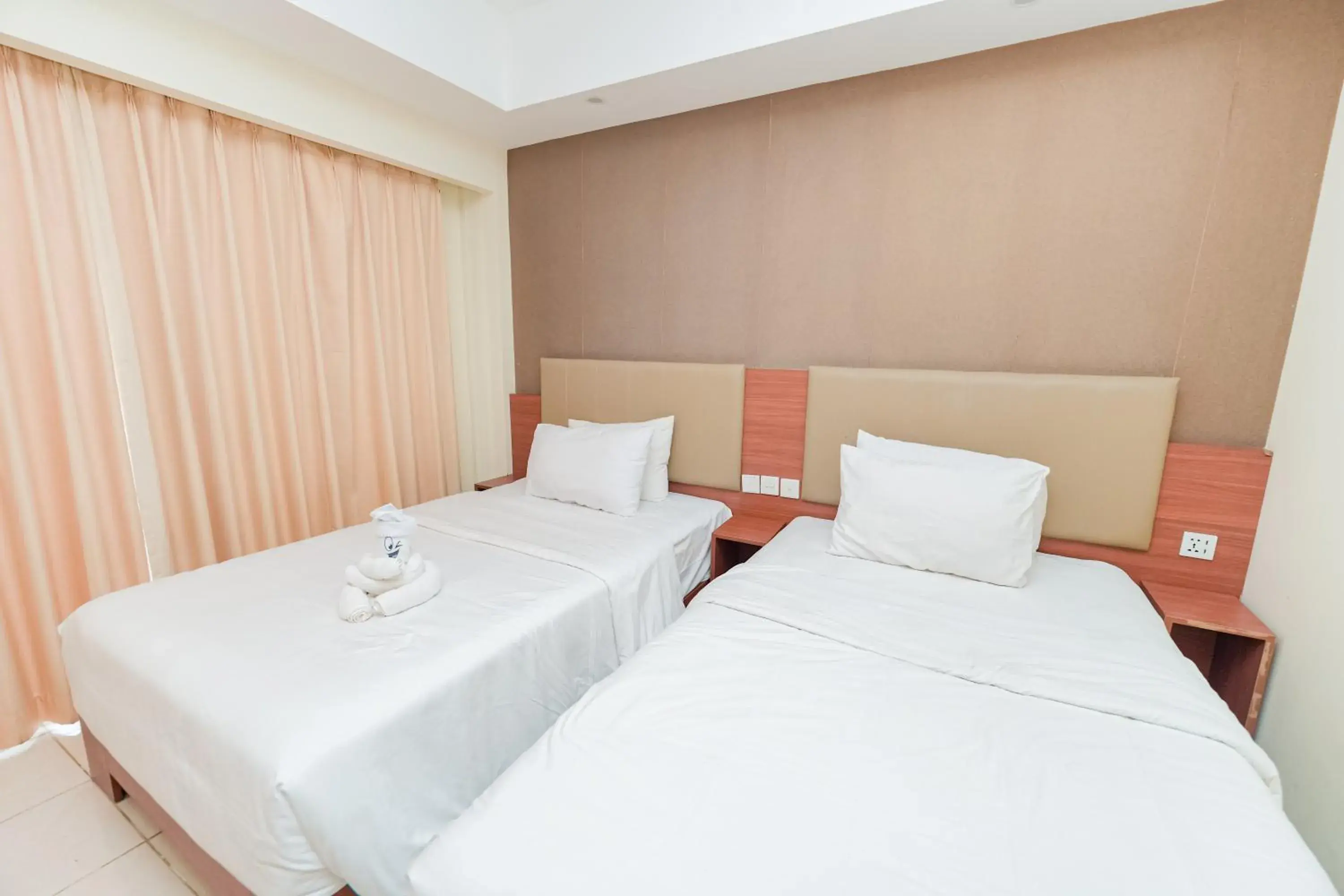 Bed in New Kuta Hotel by LORIN Bed in New Kuta Hotel by LORIN