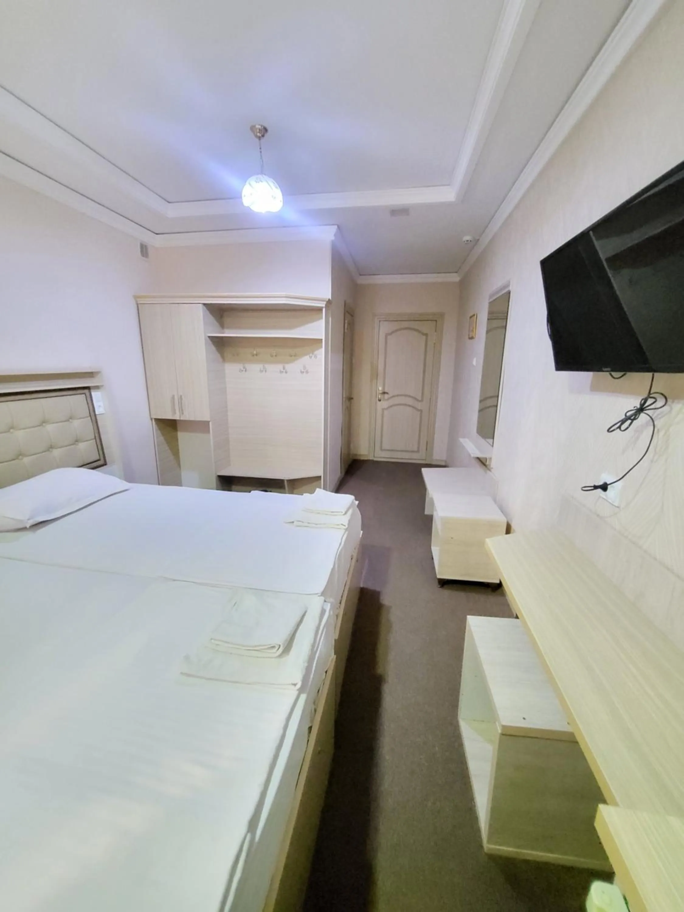 Bed in URGANCH Hotel