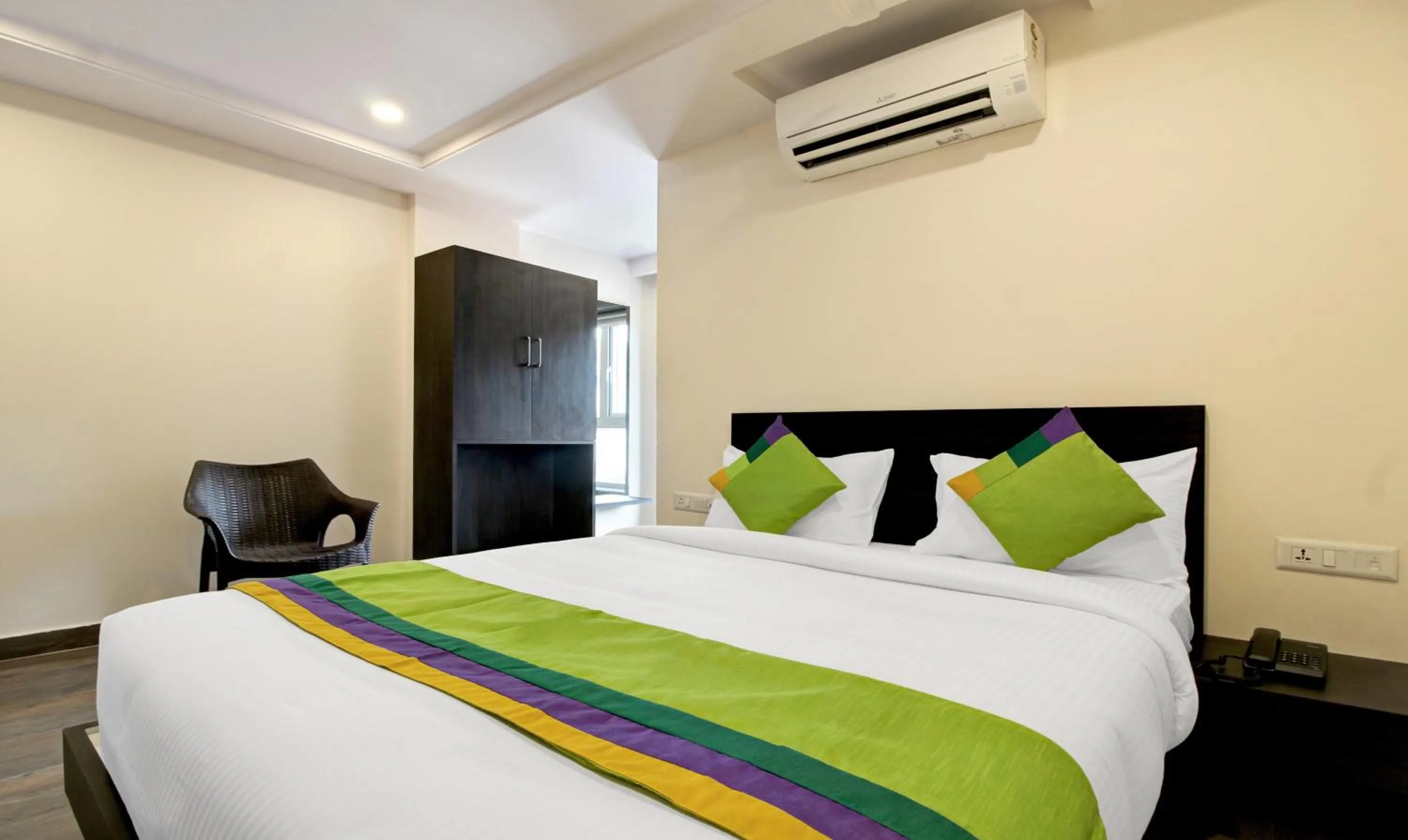 Bedroom, Bed in Treebo Excella