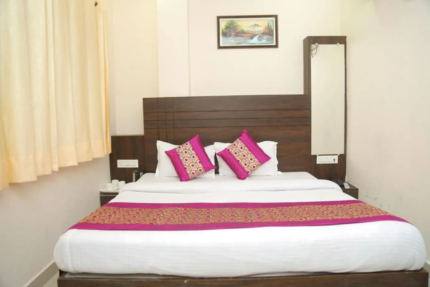 Bed in HOTEL GOLDEN DREAMS