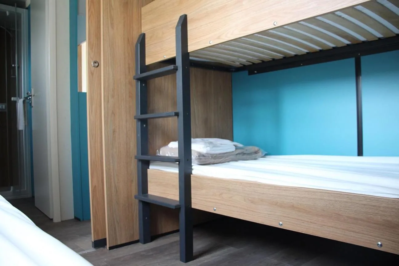 Bed in Camping Le Clos du Rhône