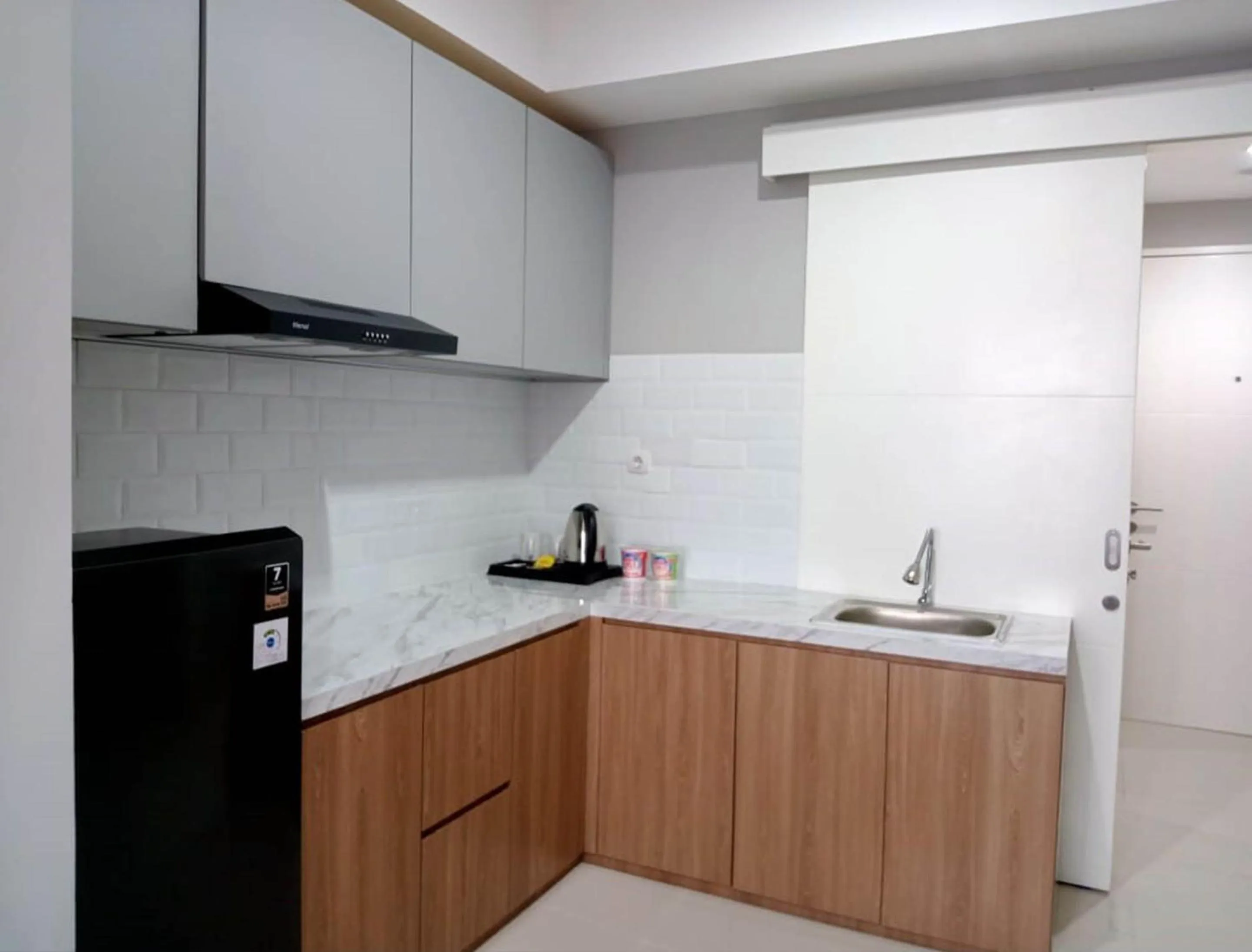 Kitchen or kitchenette in The Cozy Rooms at The Ayoma Residence, BSD Serpong