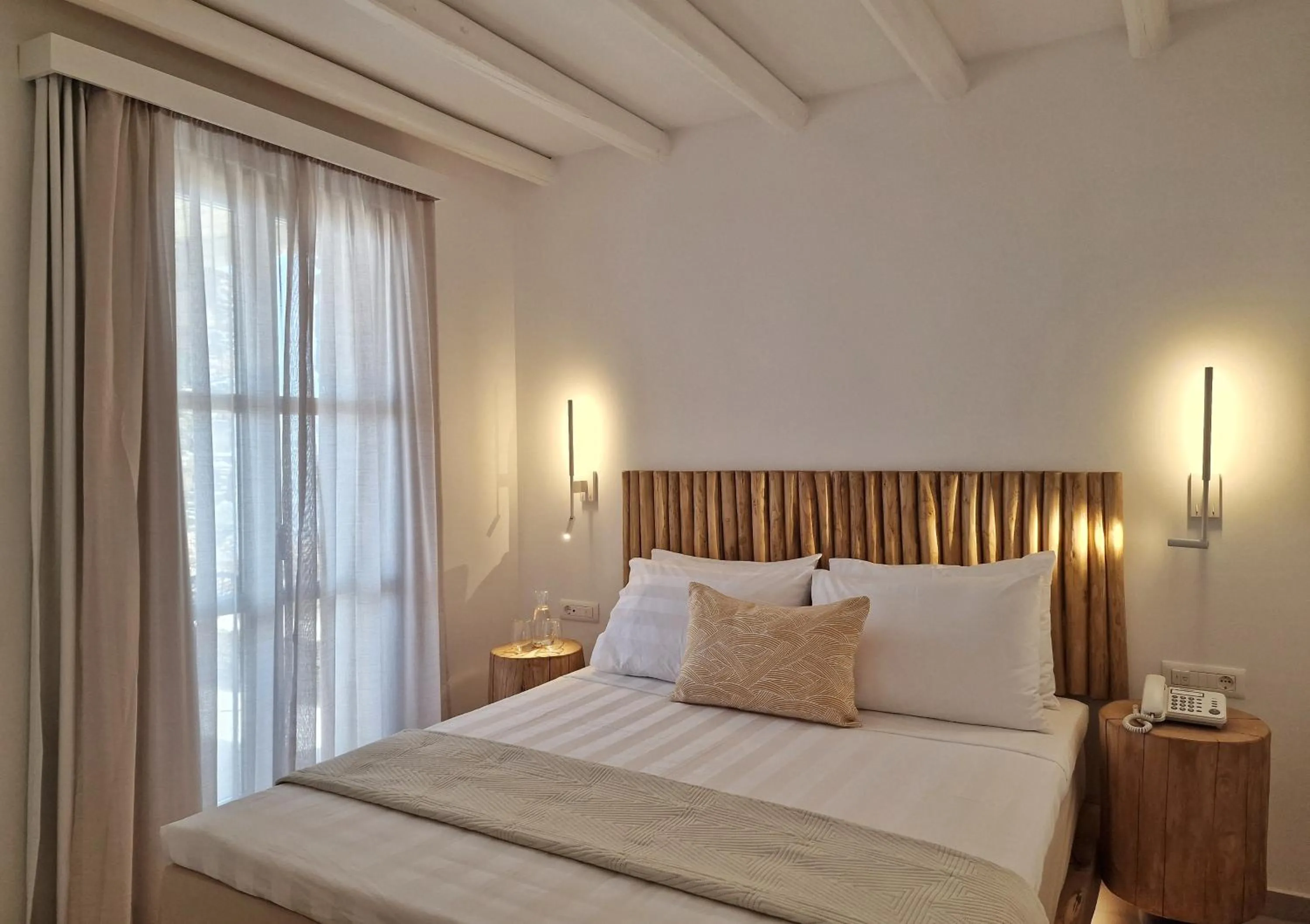 Bed in AGADA Folegandros Suites & Villas Adults Only