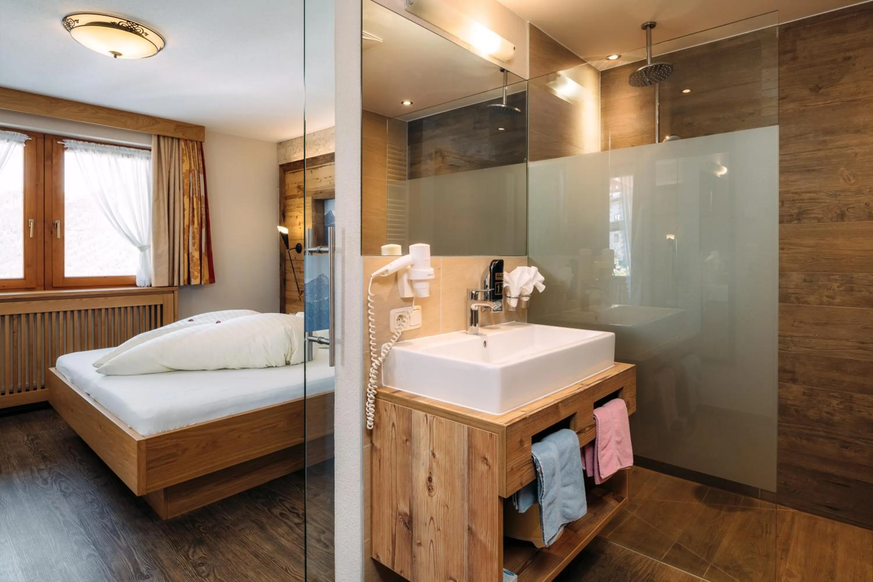 Bathroom, Bed in Kinderhotel Laderhof