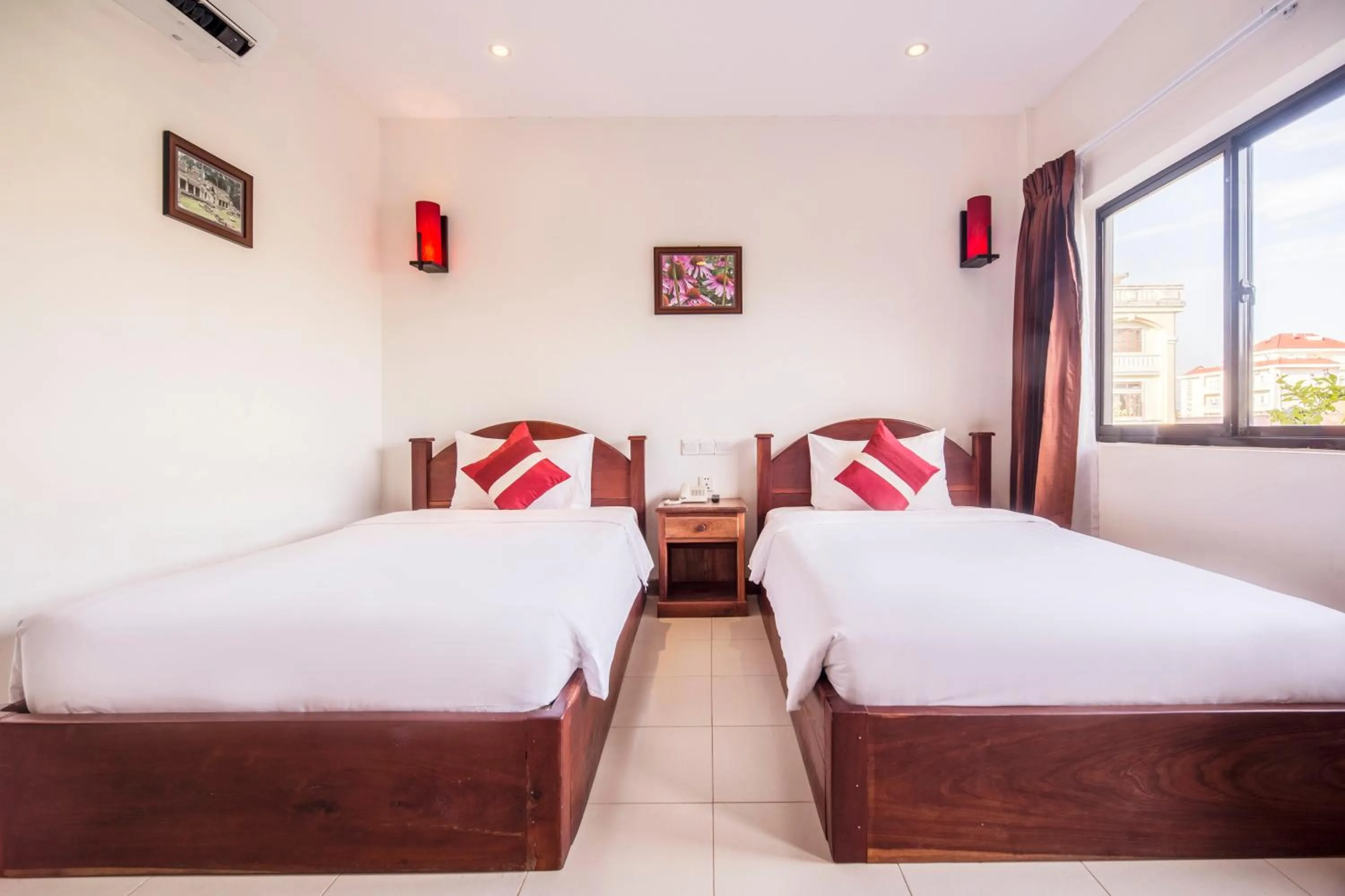 Bed in Kouprey Hotel