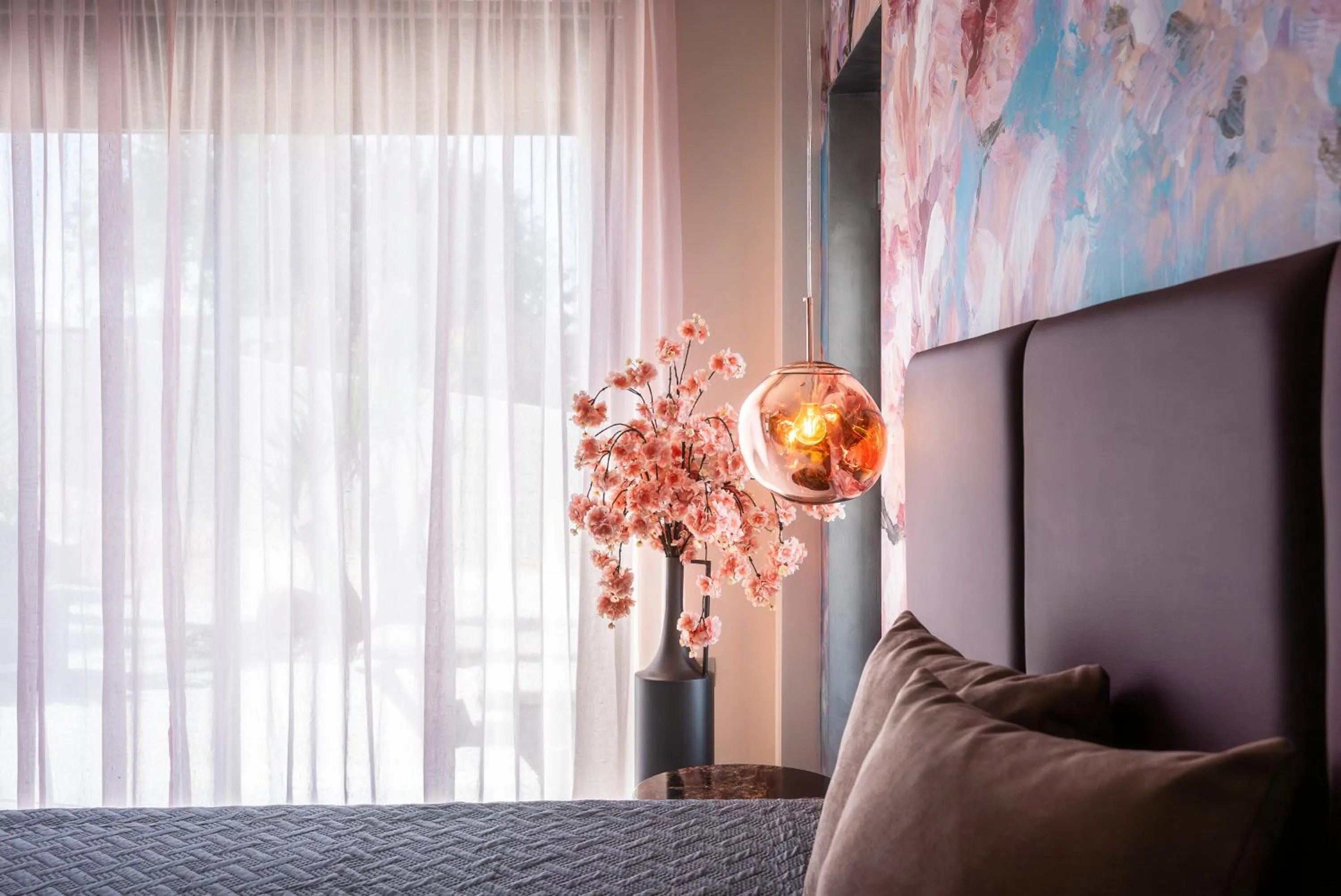 Bed in La Rêve Luxury Apartments with Private Jacuzzi