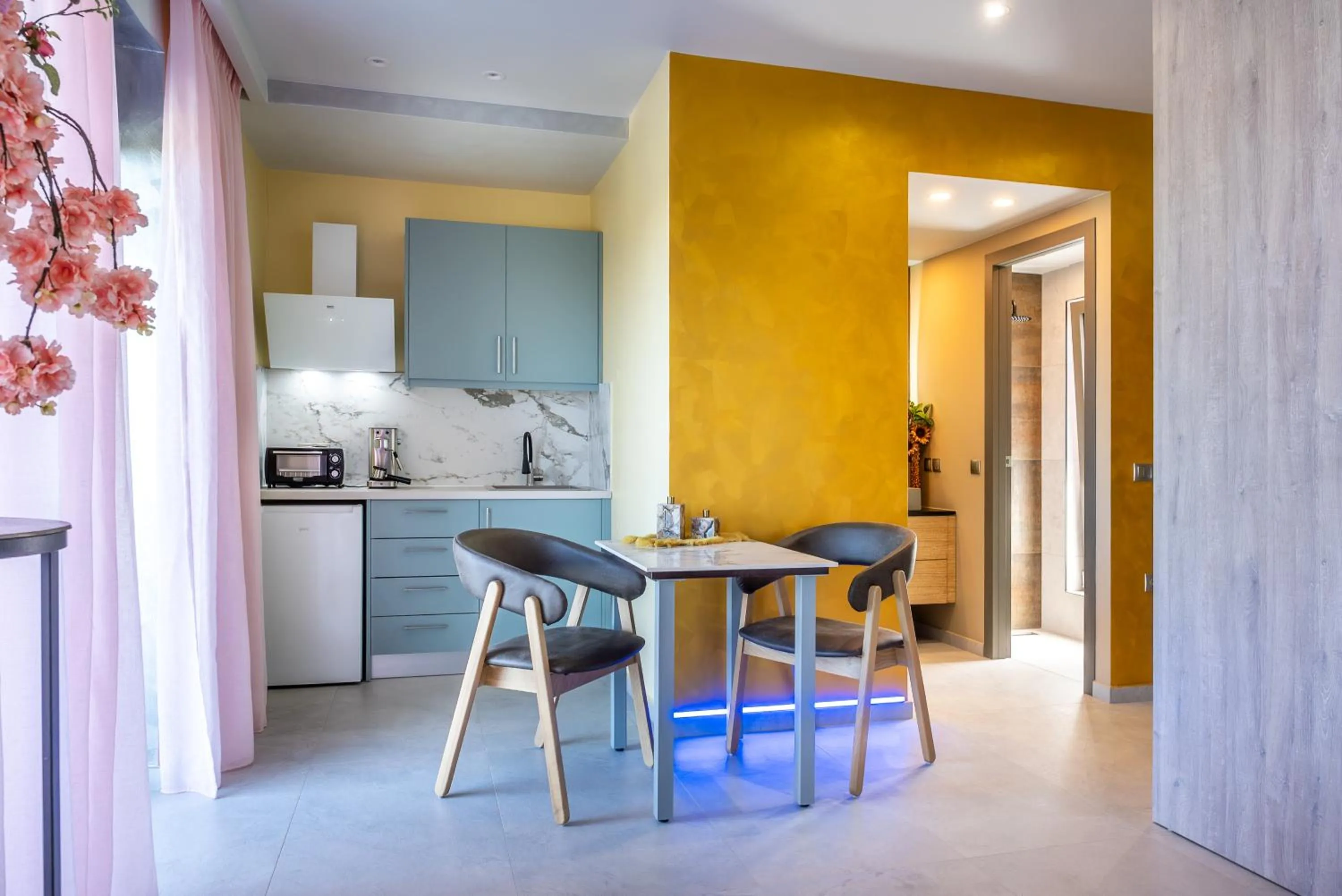 Dining area in La Rêve Luxury Apartments with Private Jacuzzi