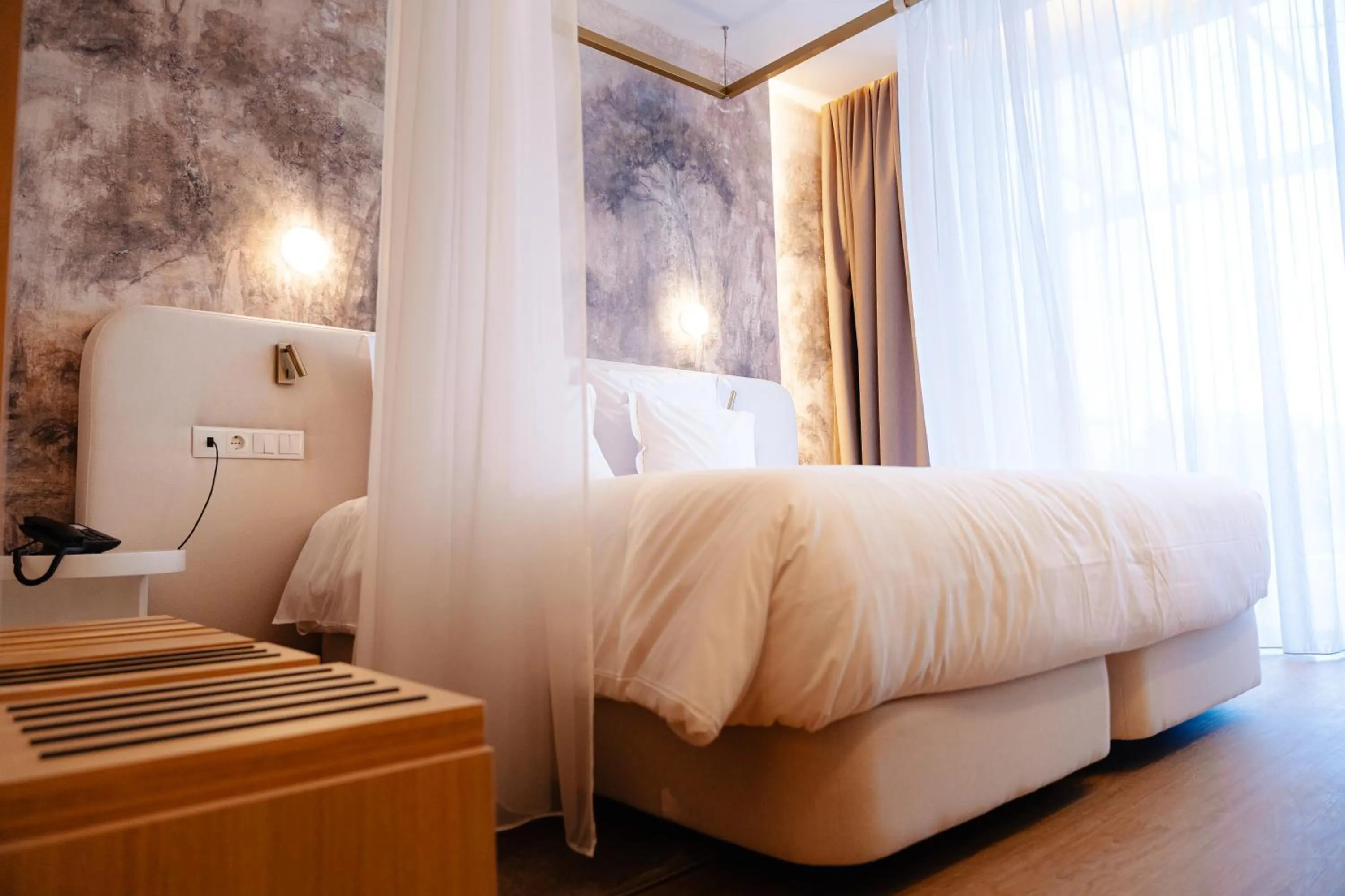 Bed in Lisotel - Hotel & Spa