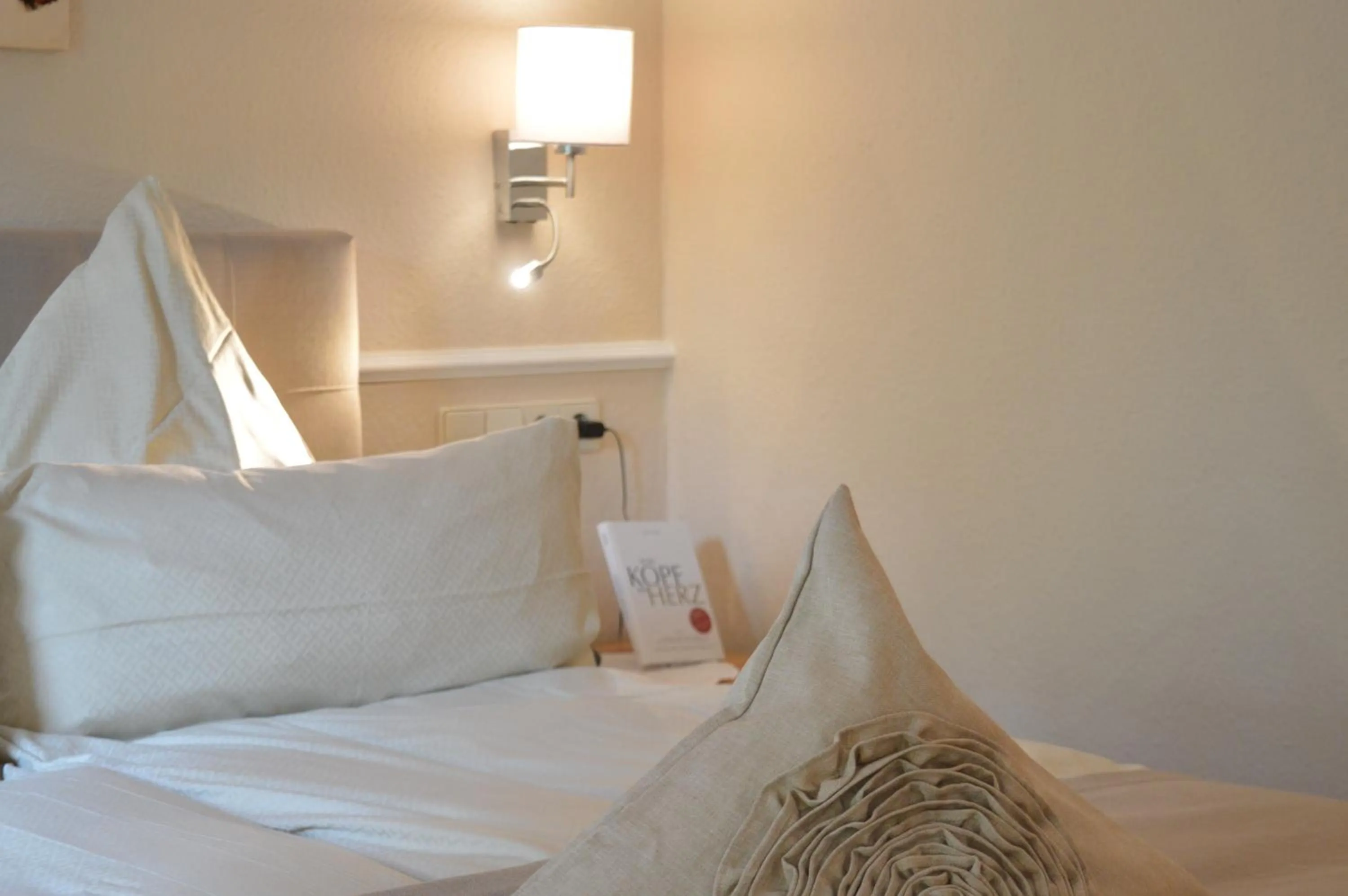 Bed in Landhaus Zum Heidewanderer mit THERMEplus