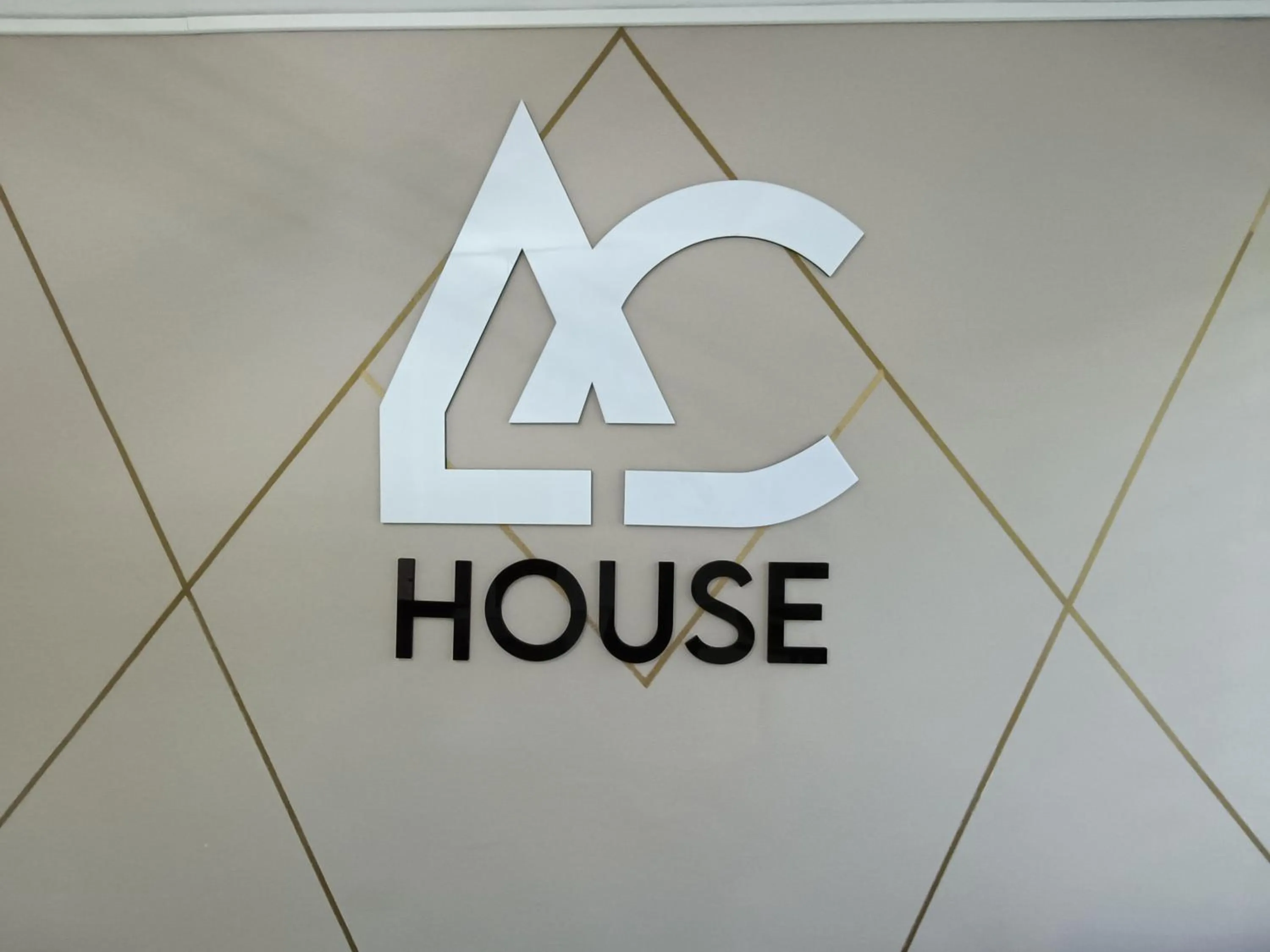 Property logo or sign in AC - House Laureles - Self Cheking