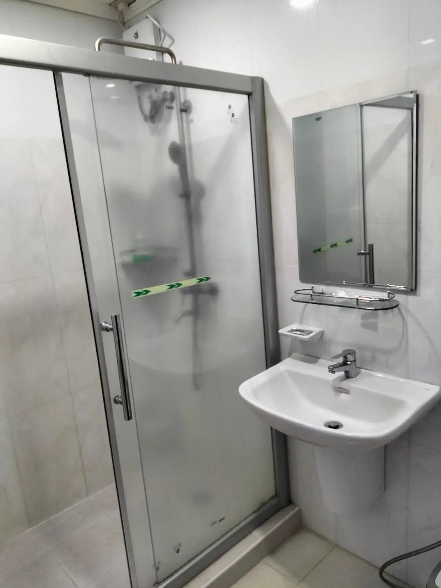 Bathroom in PJ INN HOTEL Bathroom in PJ INN HOTEL