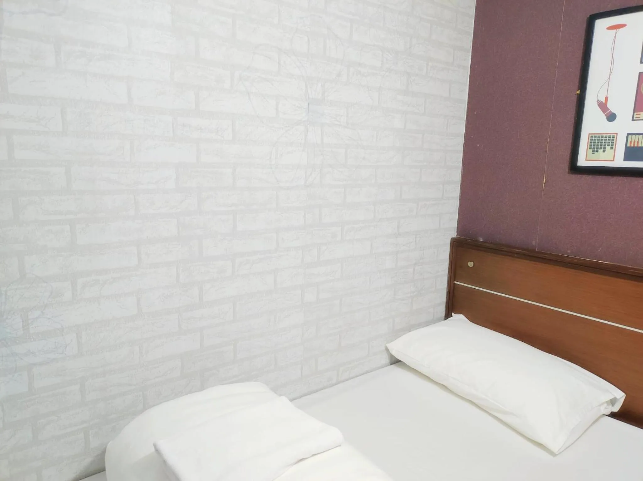 Bed in Tempo Inn West Kowloon HSR Station