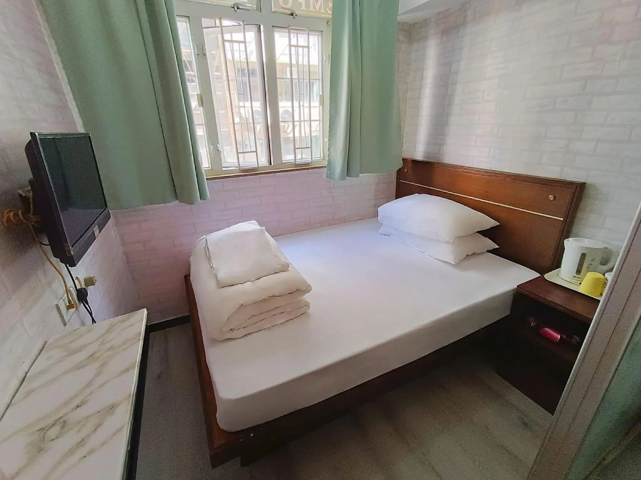 Bed in Tempo Inn West Kowloon HSR Station