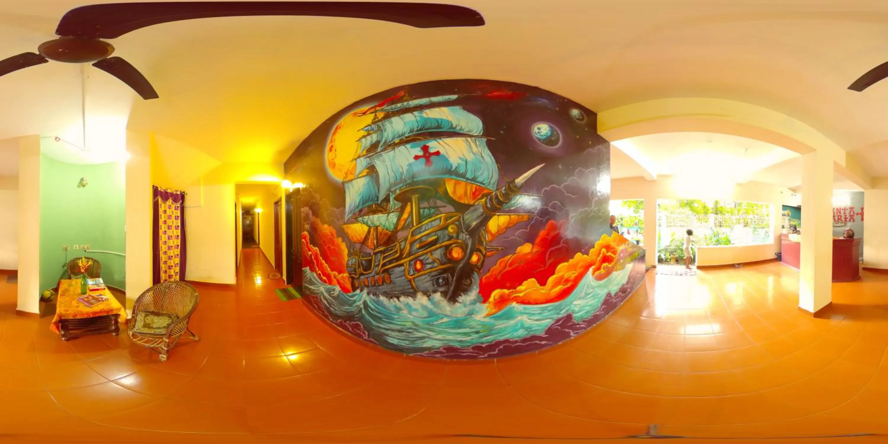 Communal lounge/ TV room in Santa Maria Hostel Kovalam