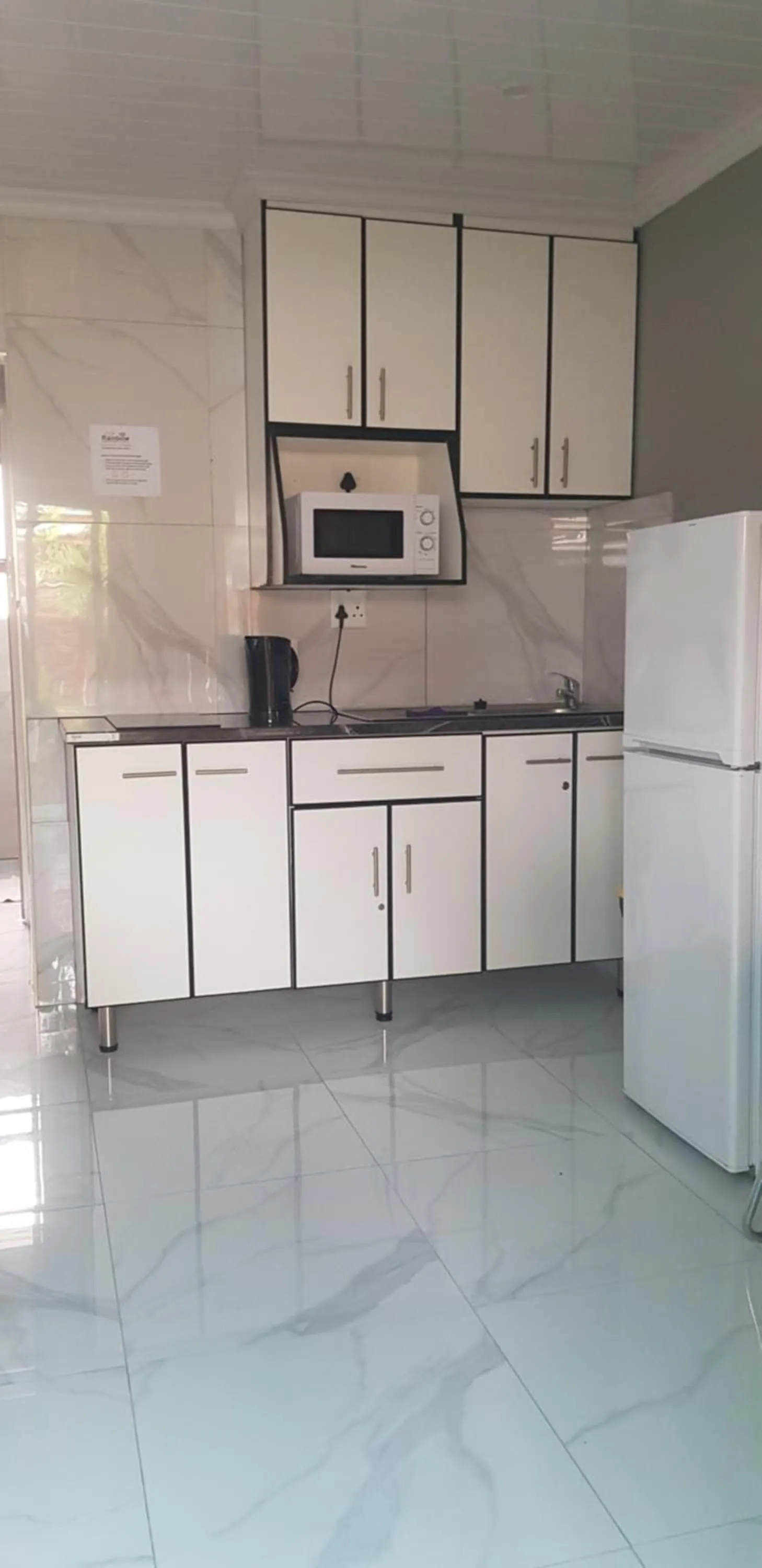 Kitchen or kitchenette in Rainbow Guest House and Tours