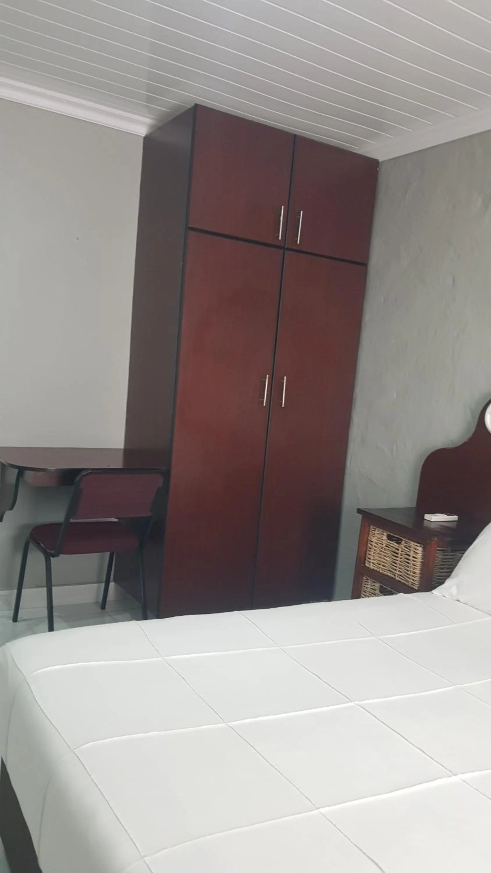 wardrobe in Rainbow Guest House and Tours