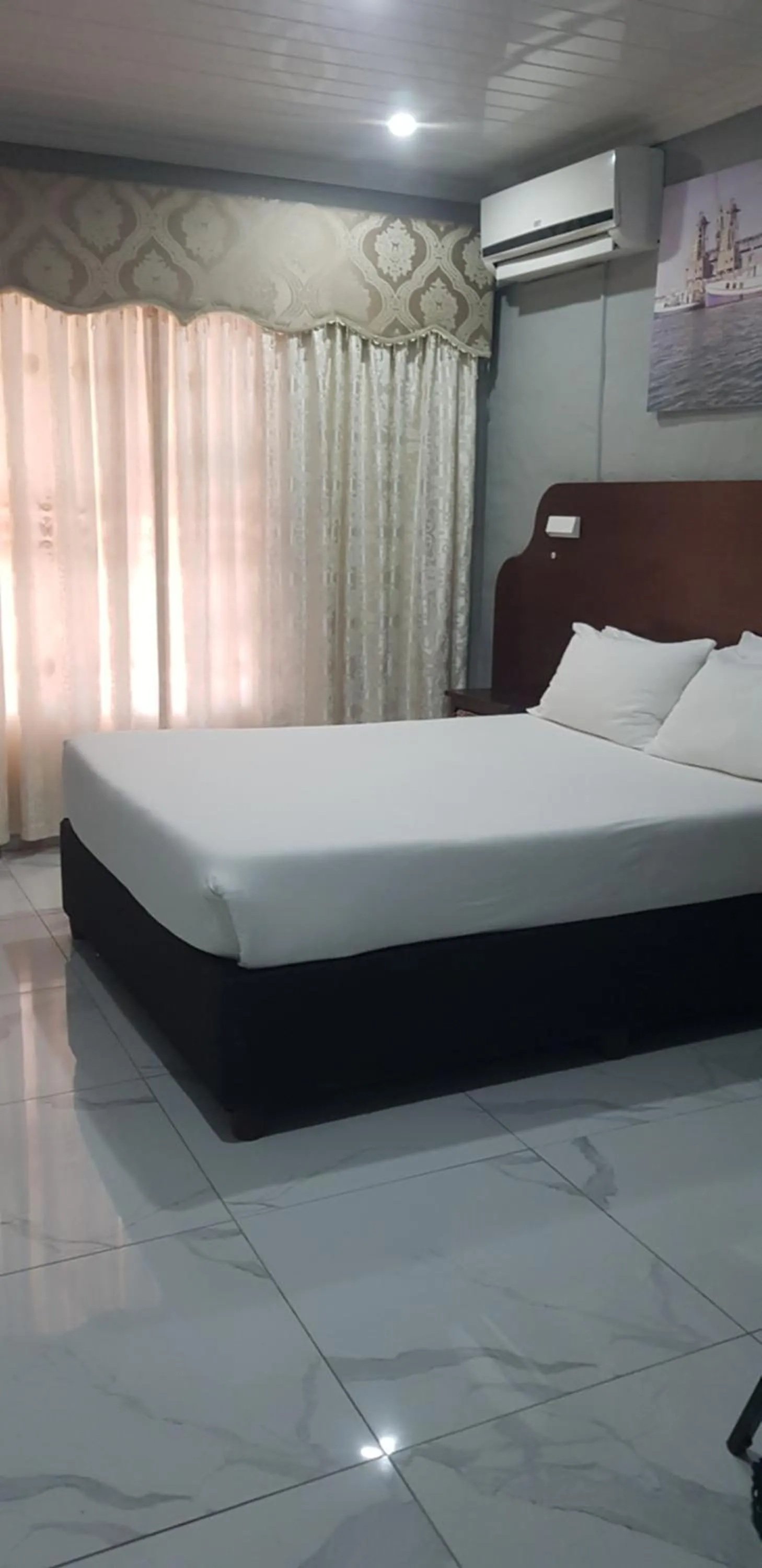 Bed in Rainbow Guest House and Tours