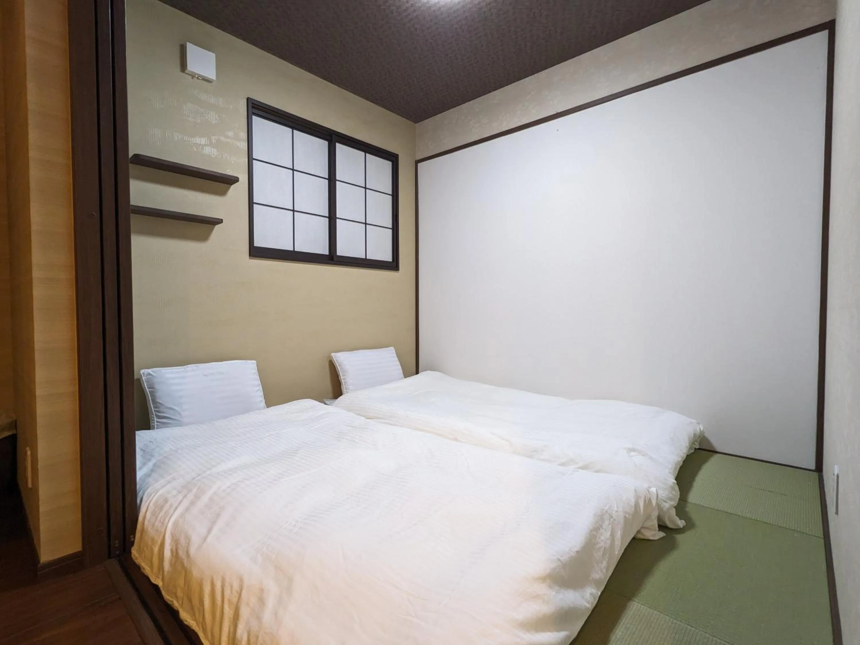 Bed in Moonlight Inn Kujo