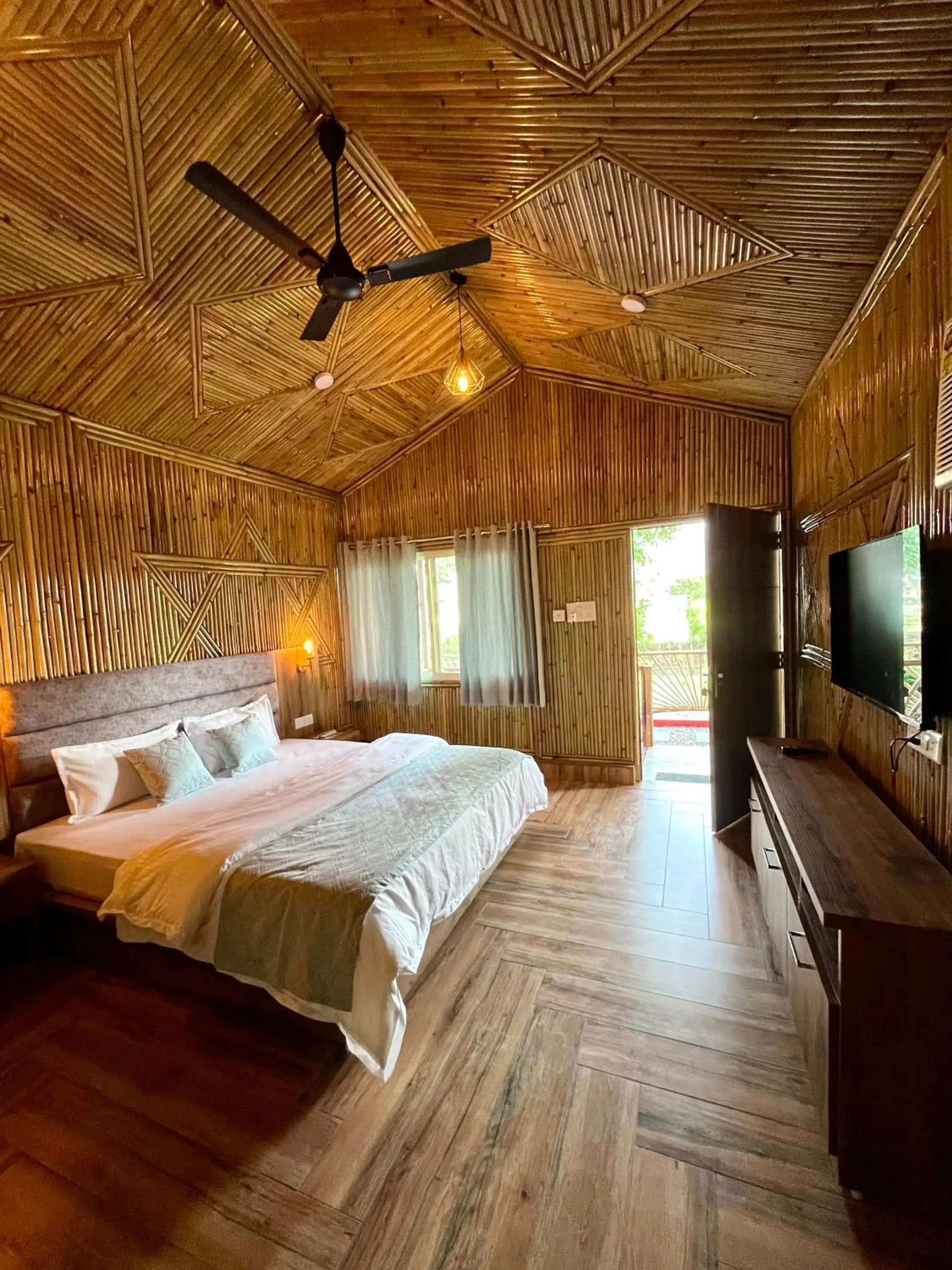 Bed in Bamboo Garden Cottages and Cafe Bed in Bamboo Garden Cottages and Cafe