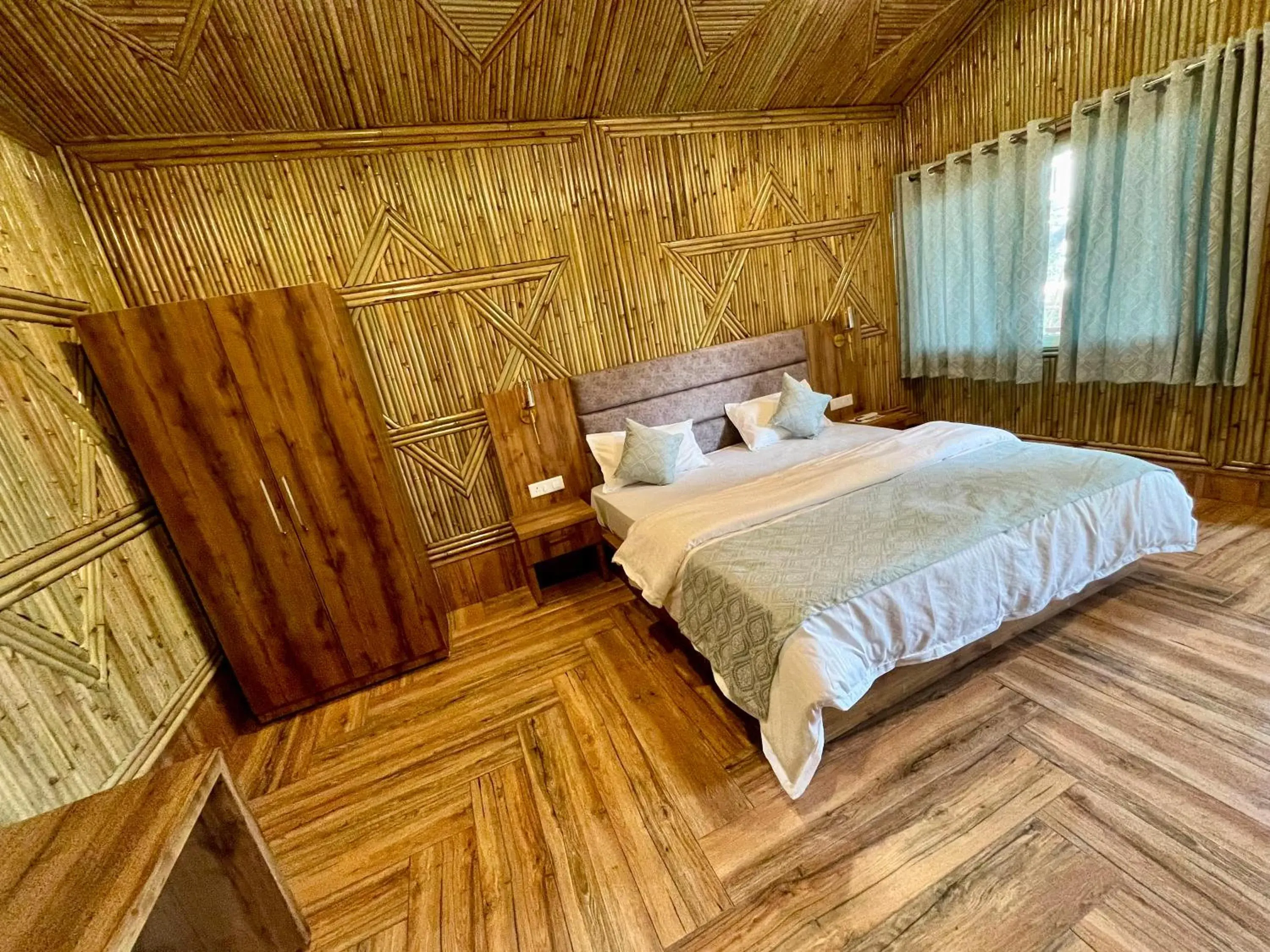 Bed in Bamboo Garden Cottages and Cafe Bed in Bamboo Garden Cottages and Cafe