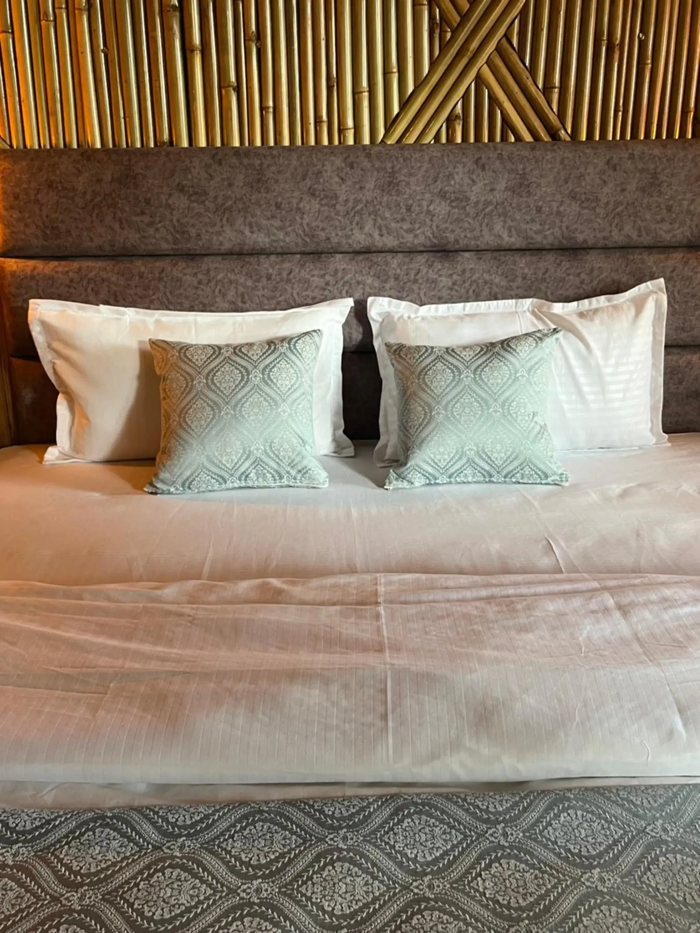 Bed in Bamboo Garden Cottages and Cafe Bed in Bamboo Garden Cottages and Cafe