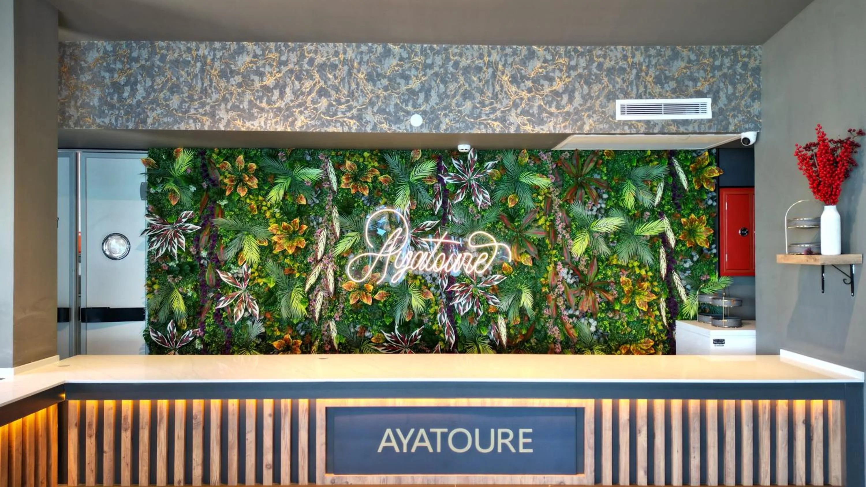 Text overlay in AYATOURE HOTEL