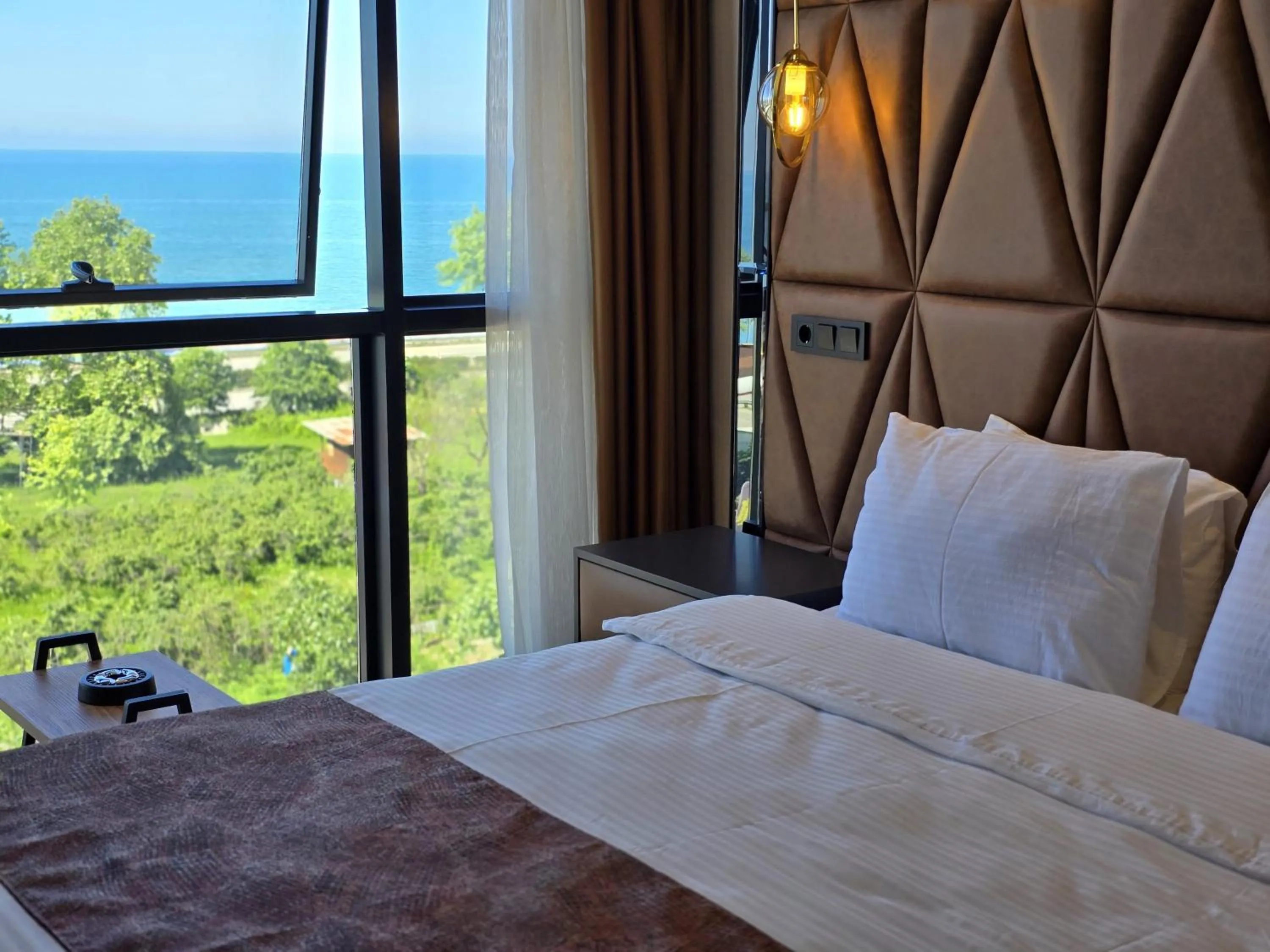 Bed in AYATOURE HOTEL