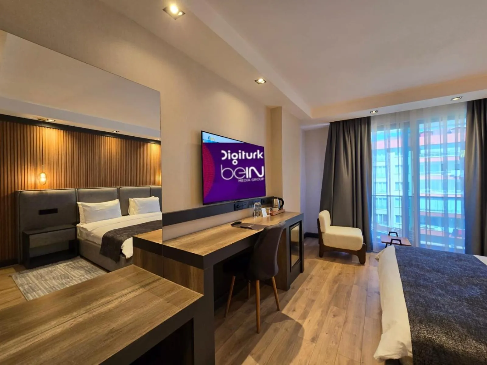 Bed in AYATOURE HOTEL