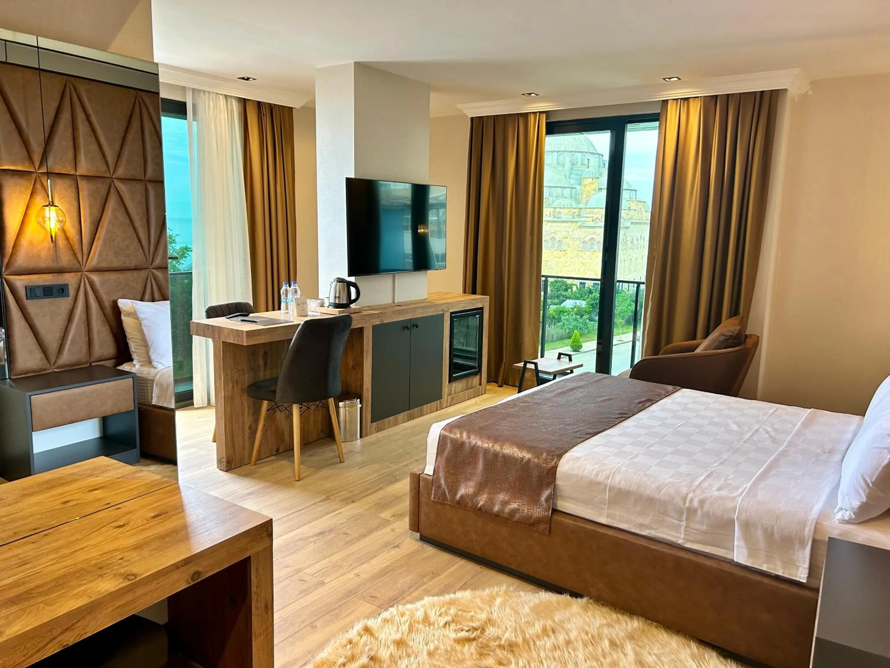 Bed in AYATOURE HOTEL