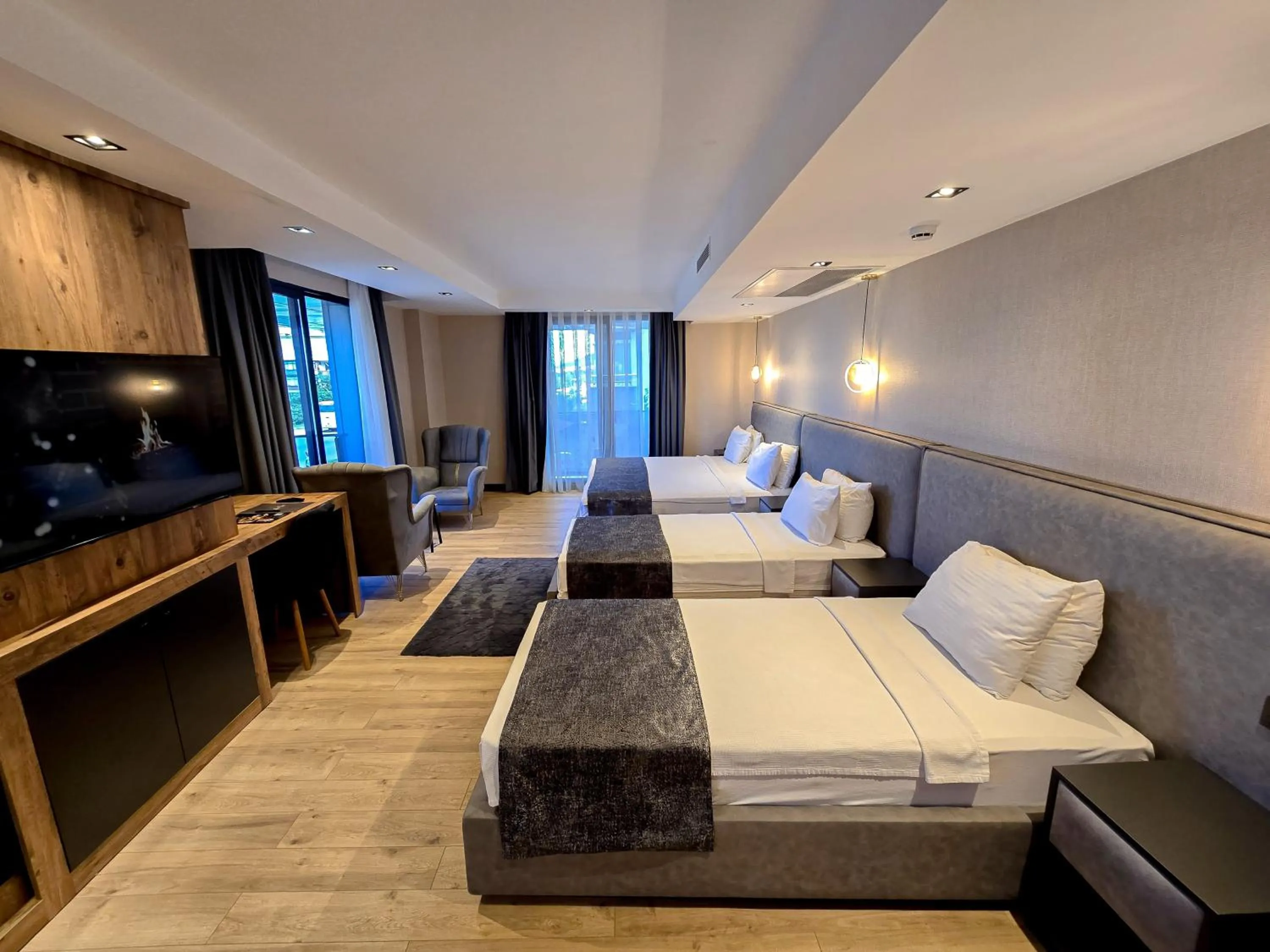 Bed in AYATOURE HOTEL