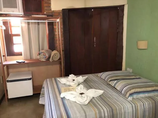 Bed in Pousada do Capitão