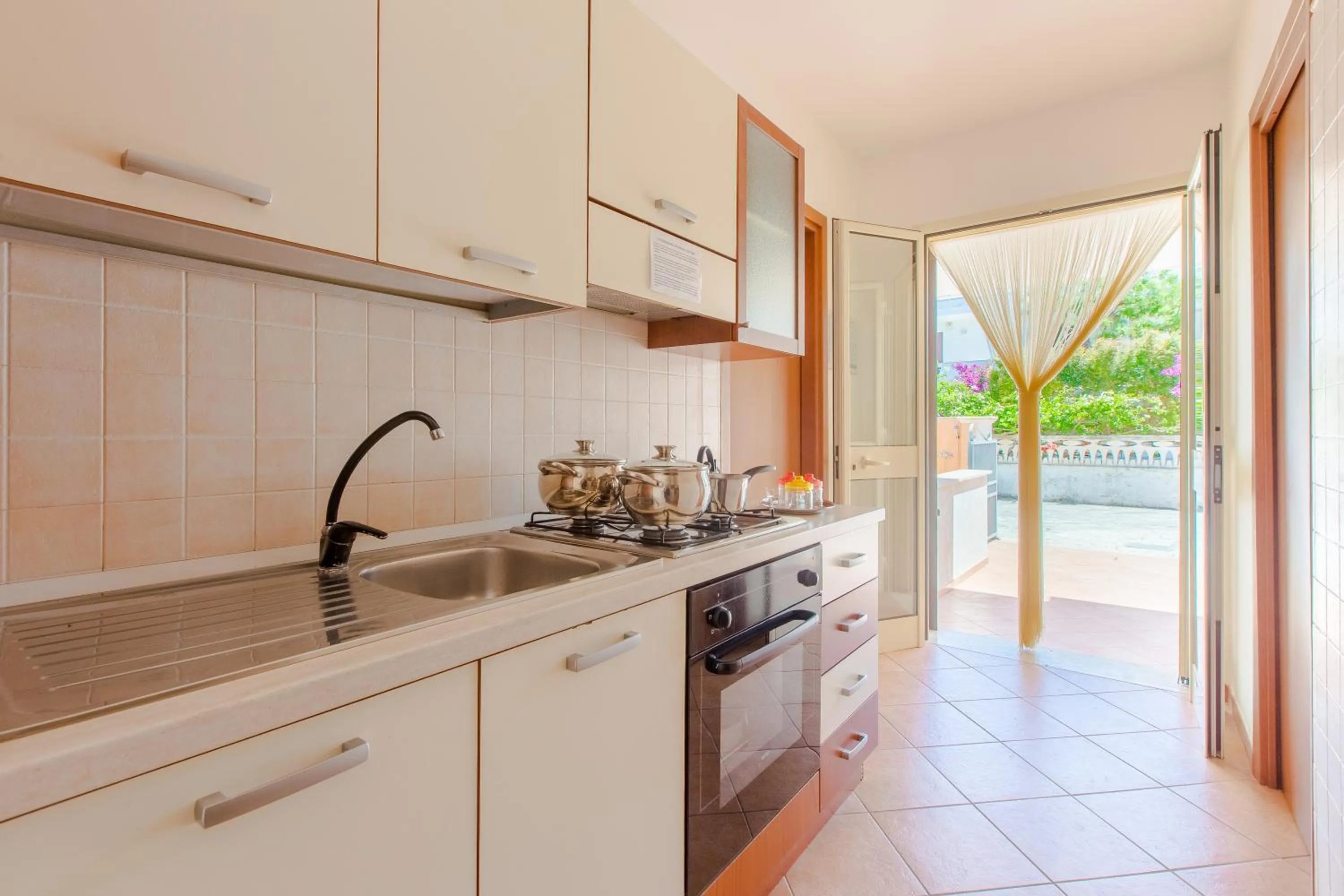 Kitchen or kitchenette in Villa Orchidea
