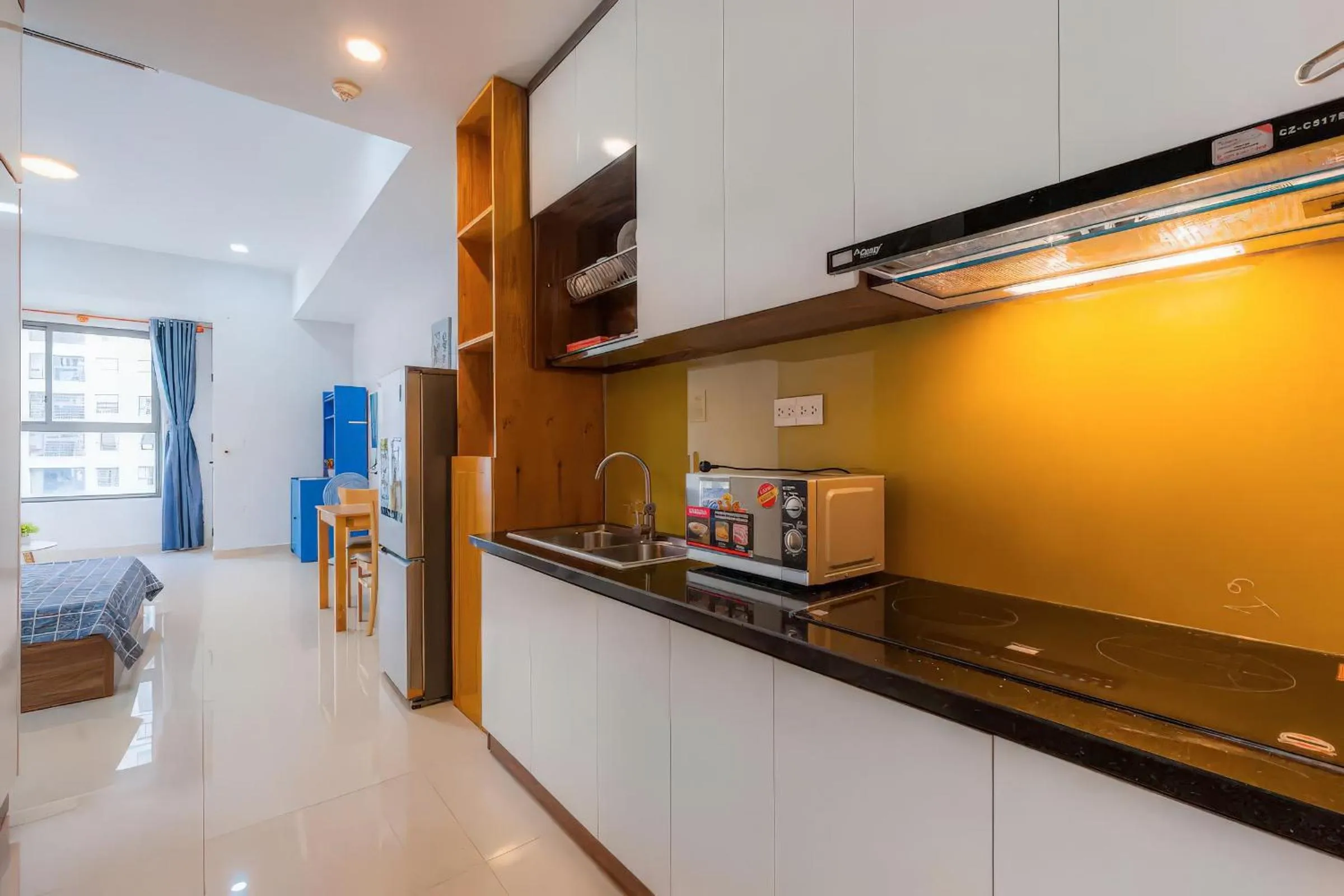 Kitchen or kitchenette in Minute Suites - Botanica Orchard TSN Airport