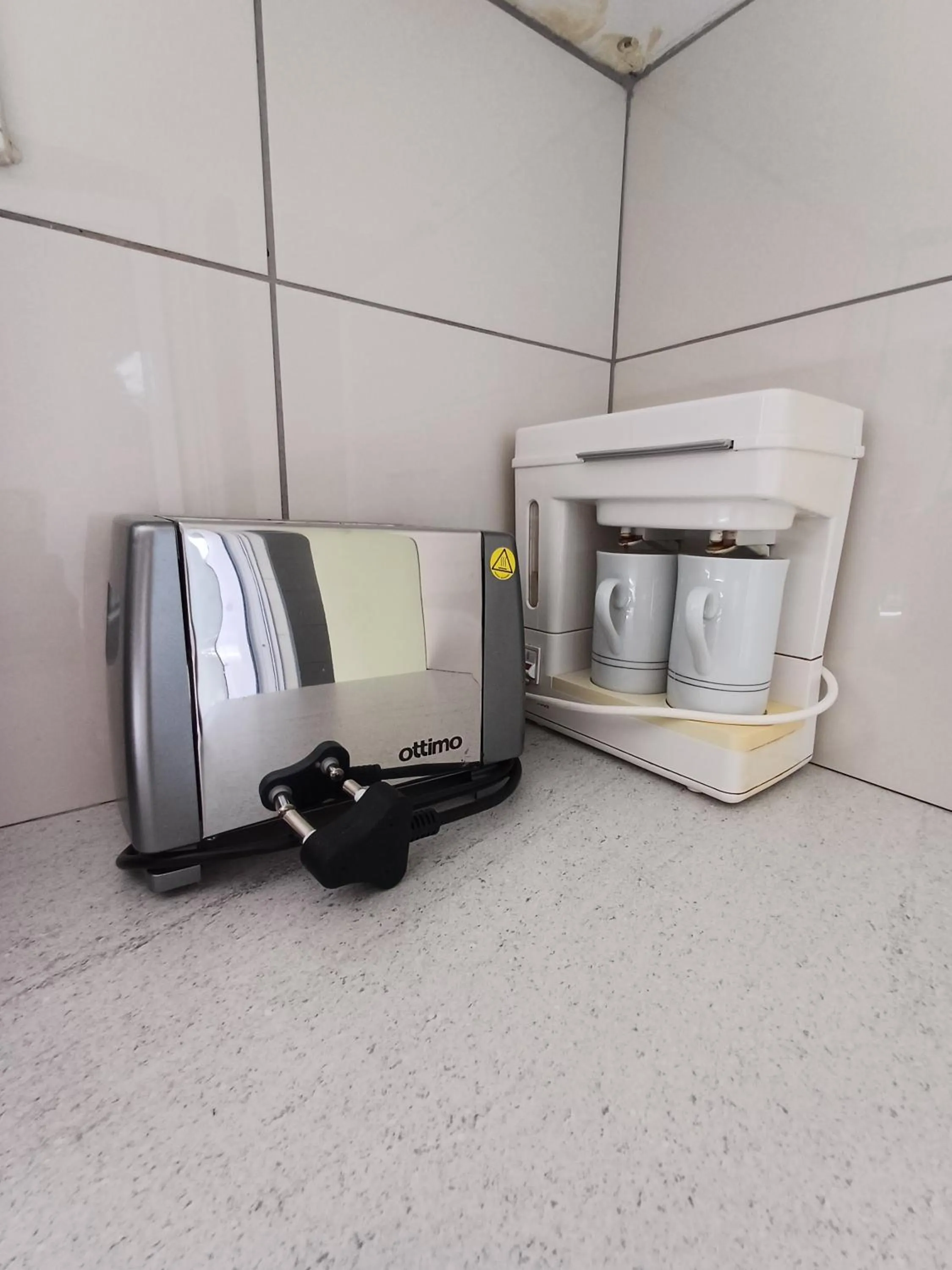 toaster in Capbon Guesthouse
