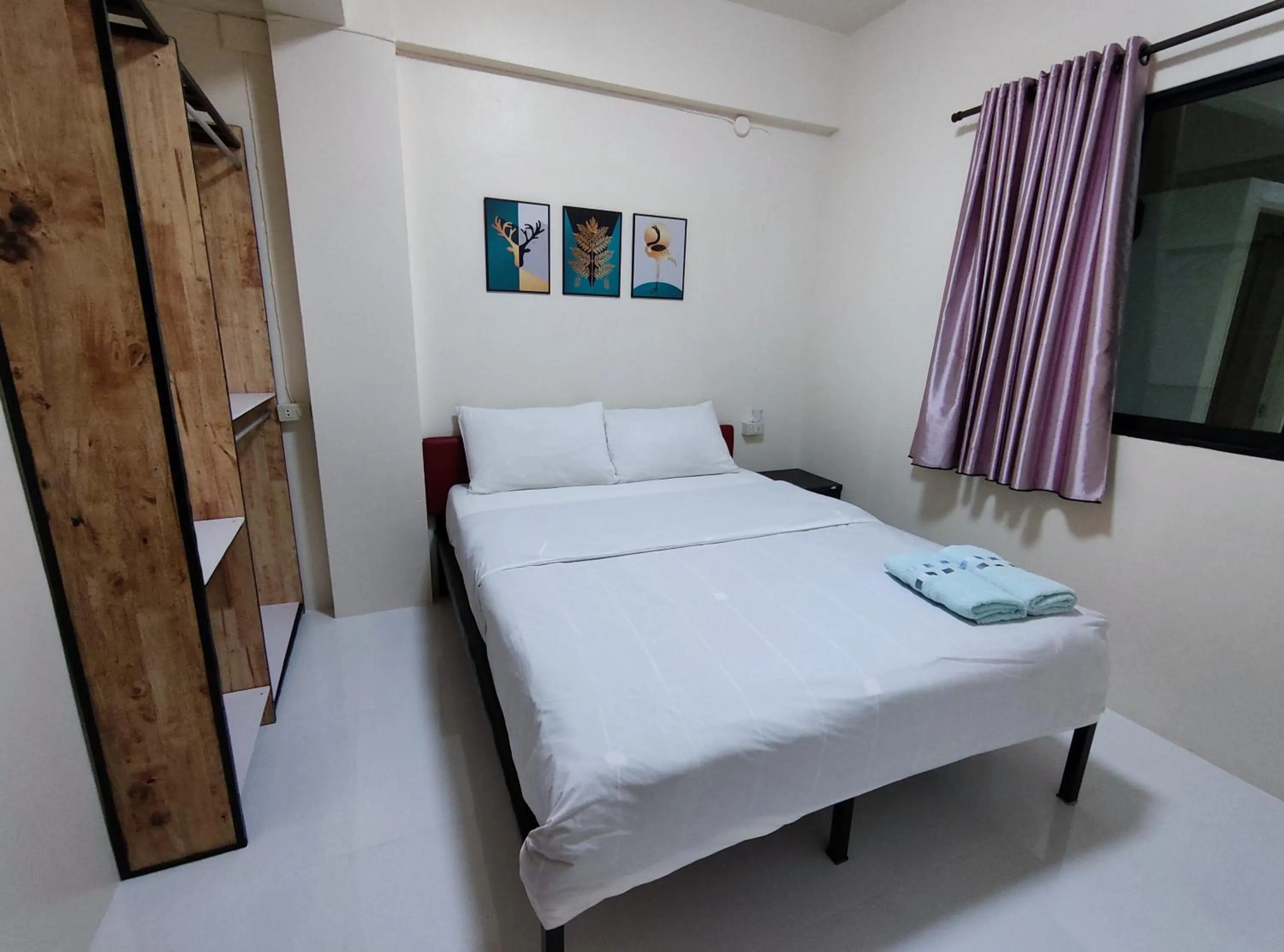 Bed in 168 Chiangmai Guesthouse