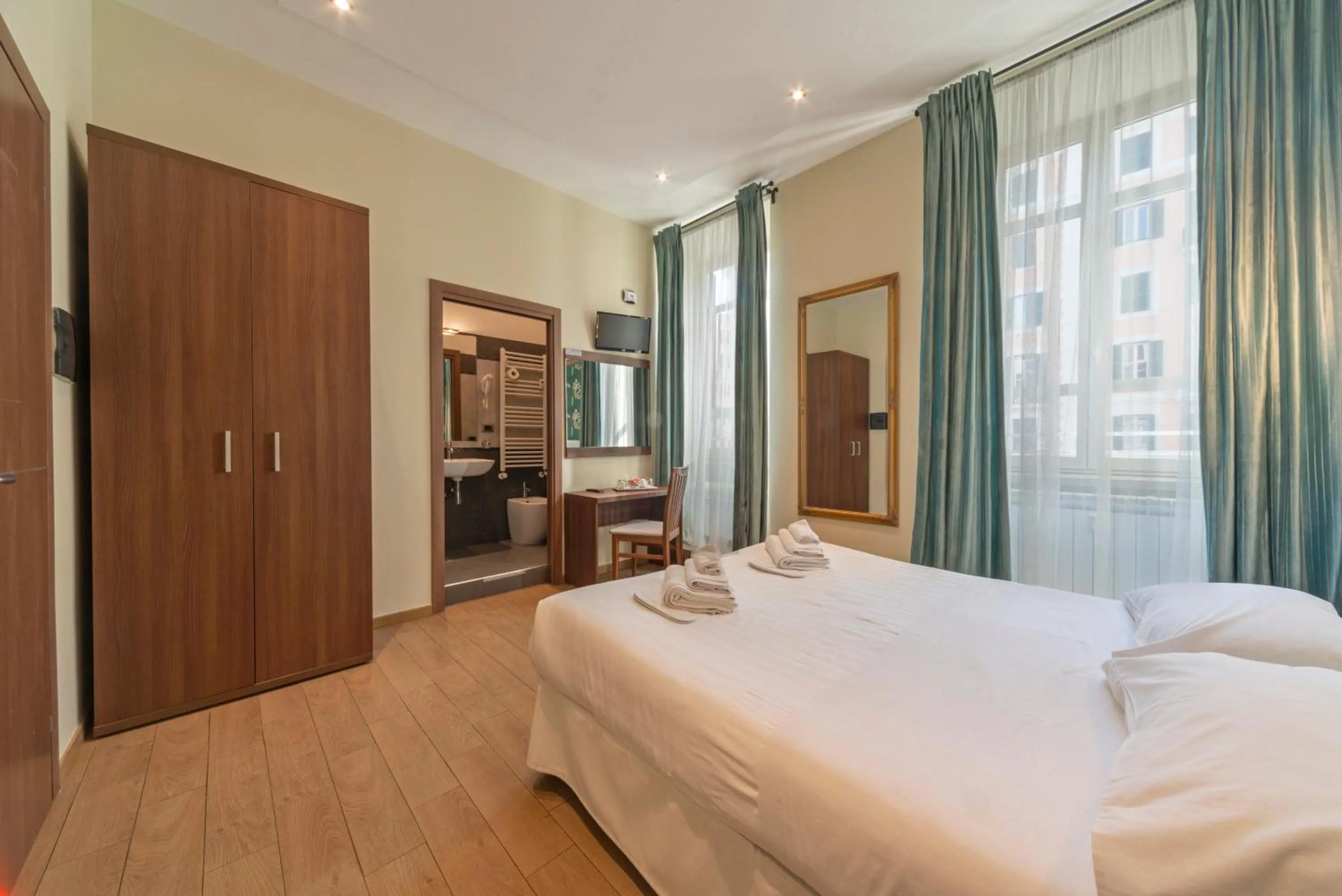 Bed in La Grande Bellezza Guest House Rome