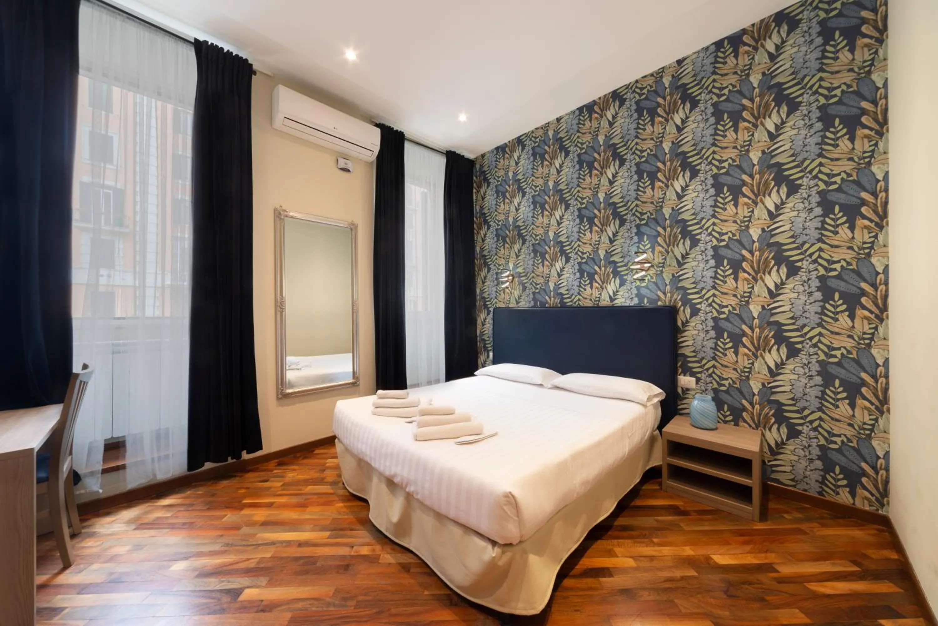 Bed in La Grande Bellezza Guest House Rome