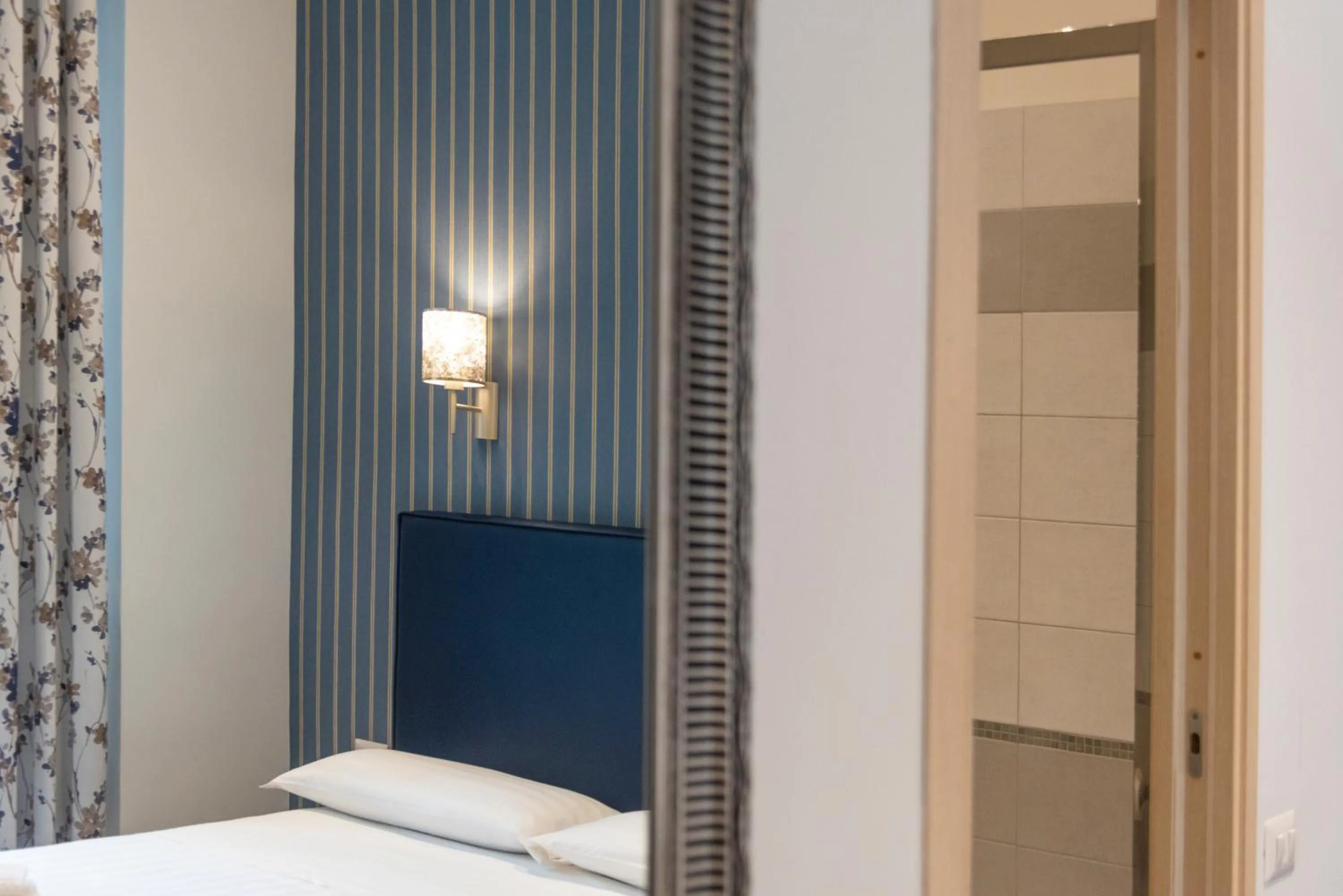 Bed in La Grande Bellezza Guest House Rome