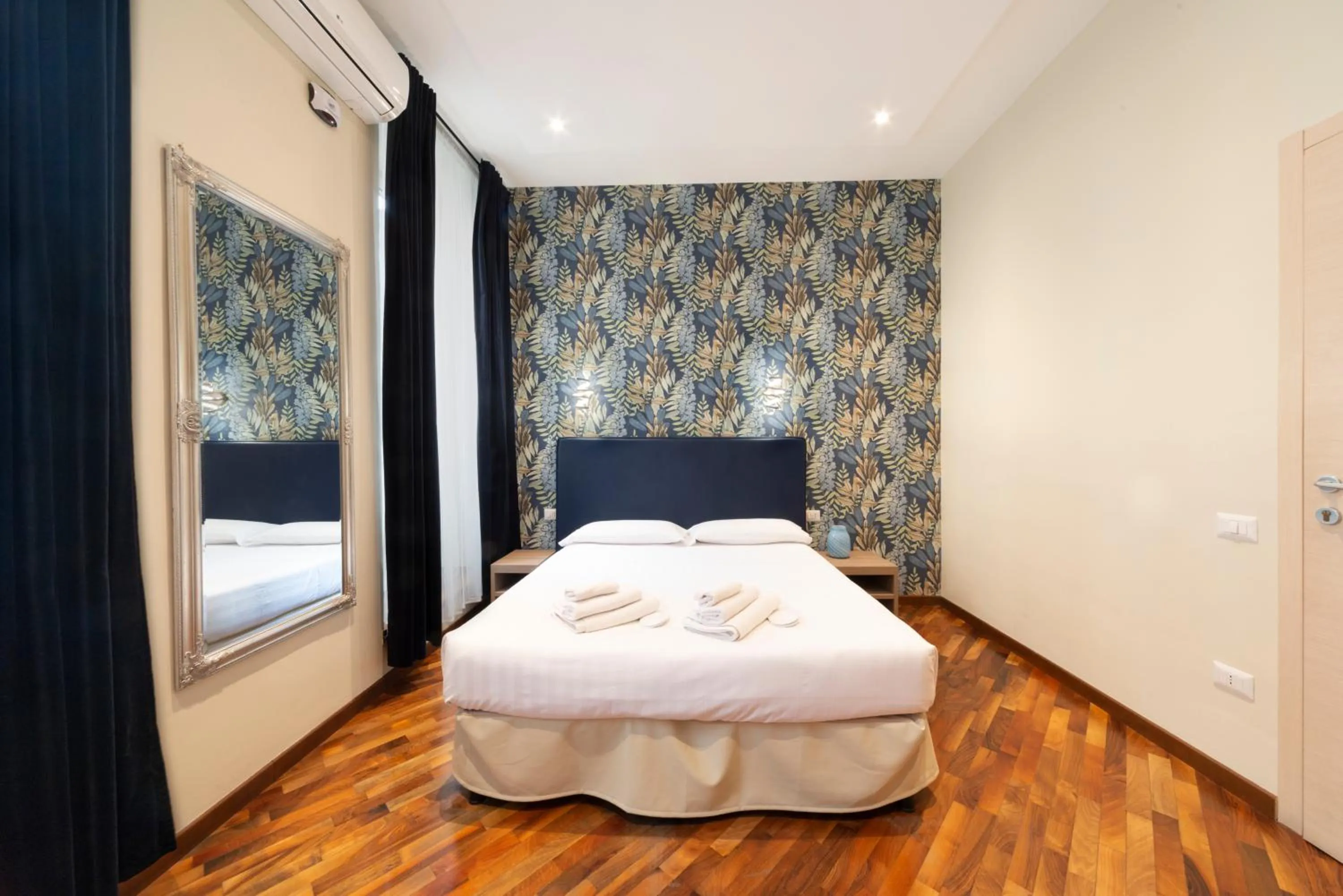 Bed in La Grande Bellezza Guest House Rome