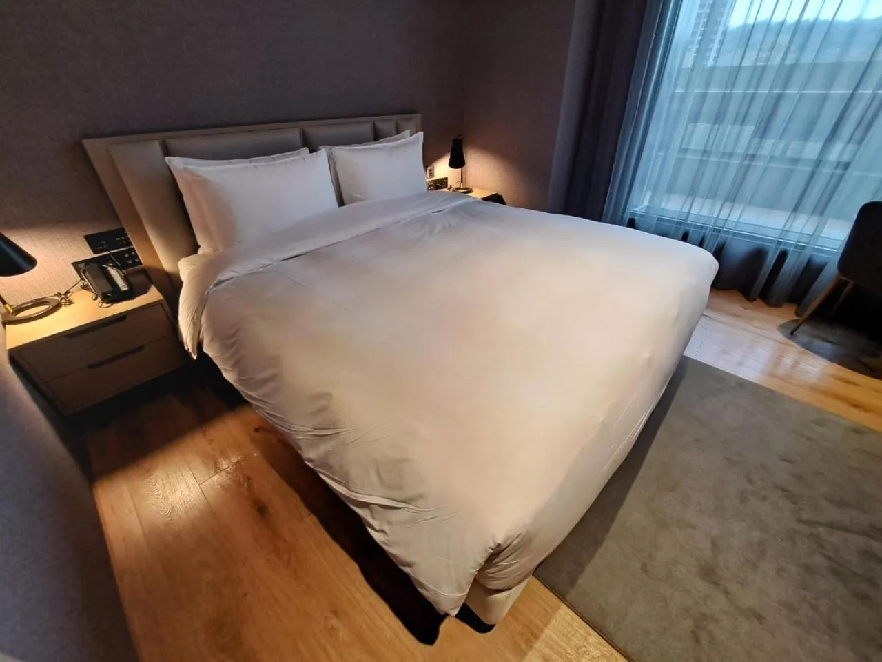Bed in Boutech Wuri Village Hotel