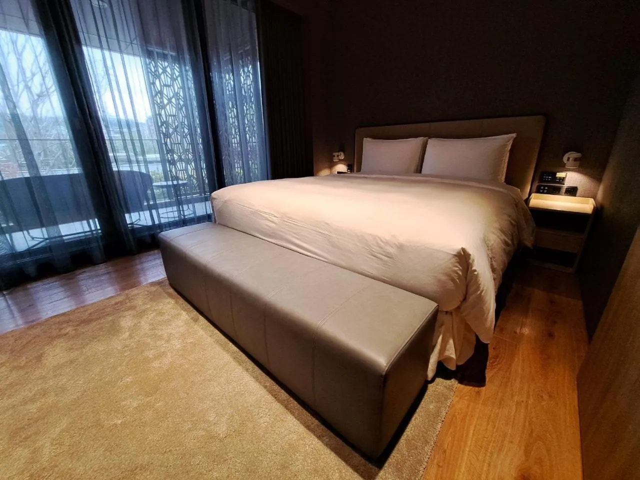 Bed in Boutech Wuri Village Hotel