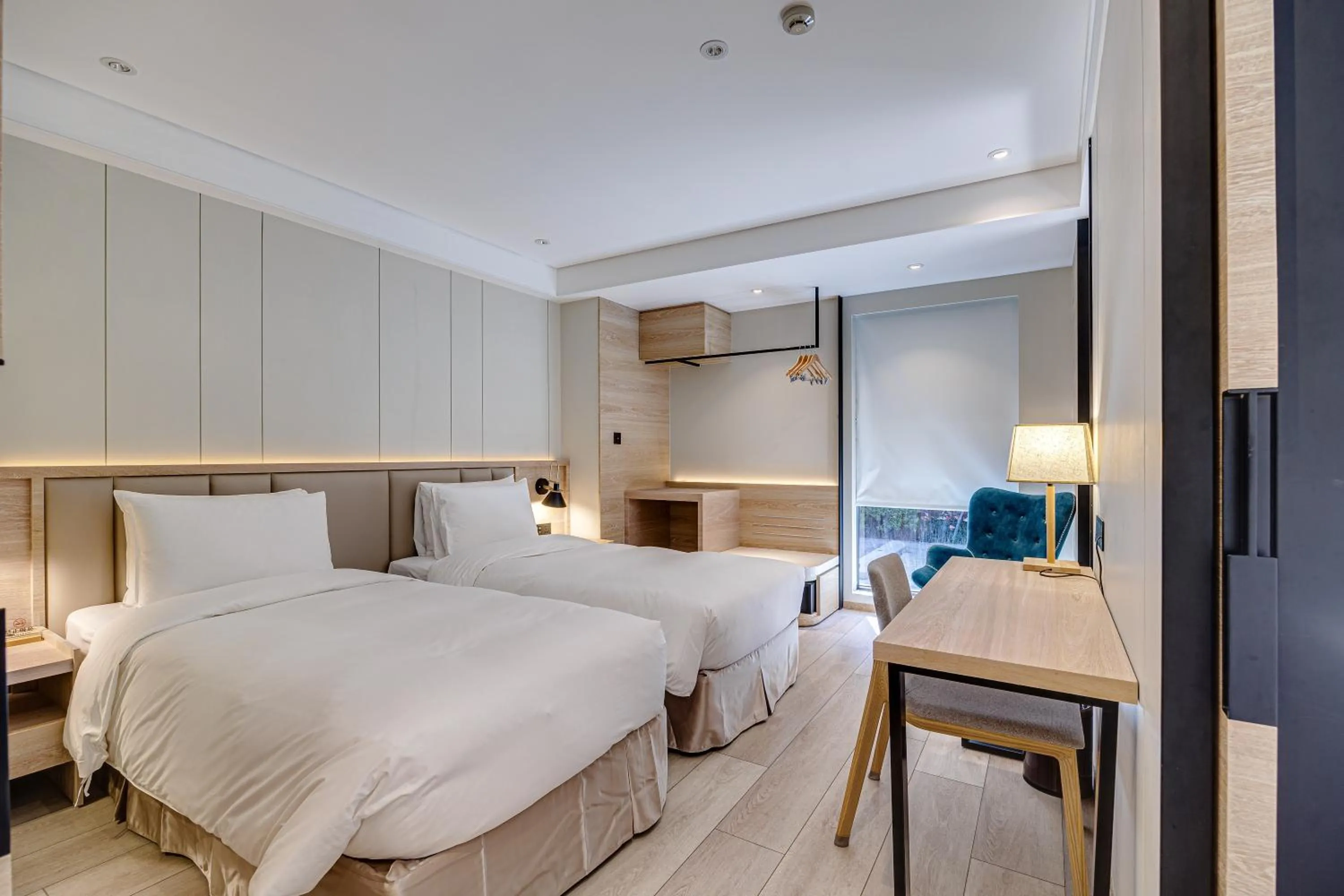 Bed in Boutech Wuri Village Hotel