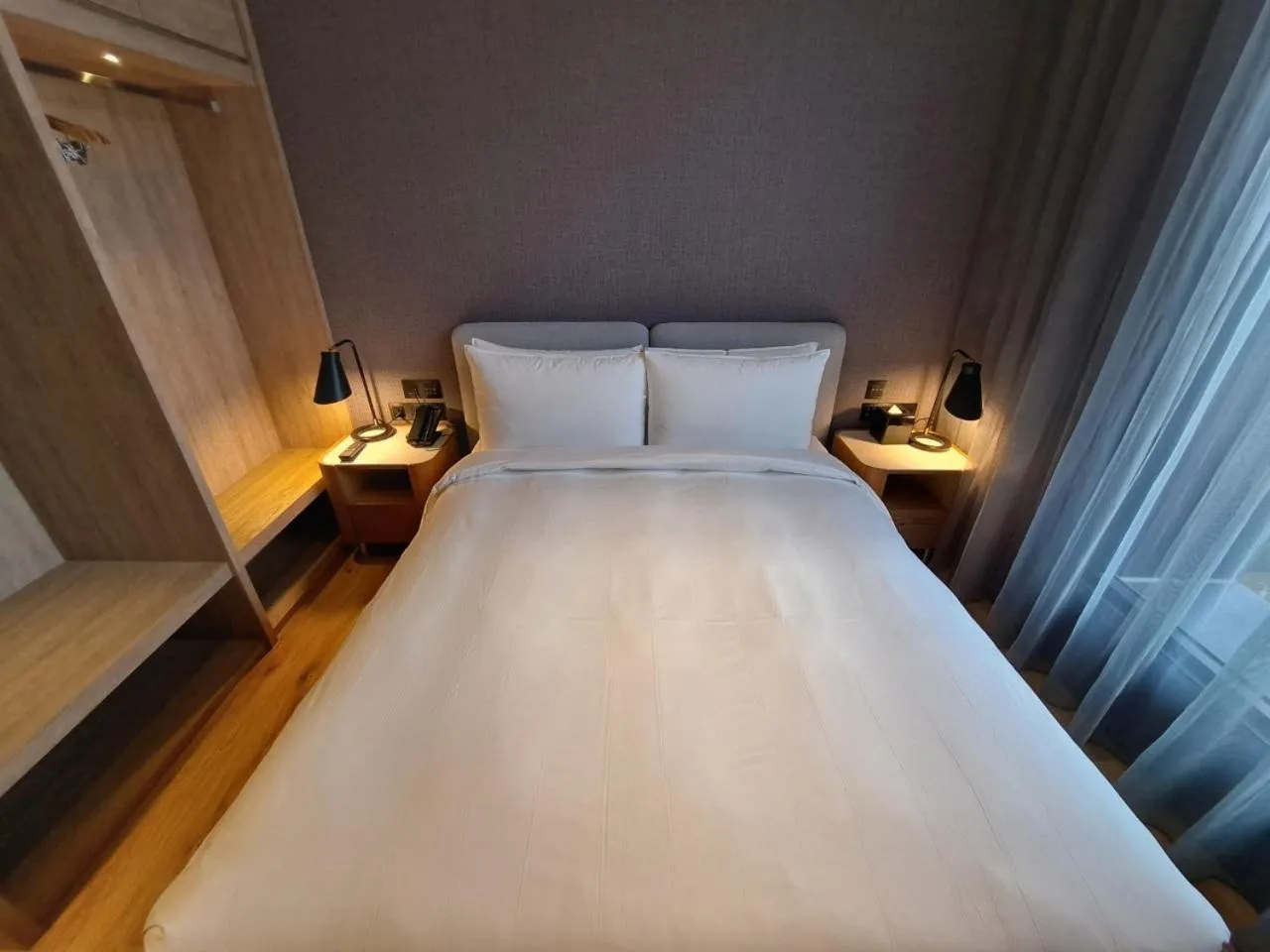 Bed in Boutech Wuri Village Hotel