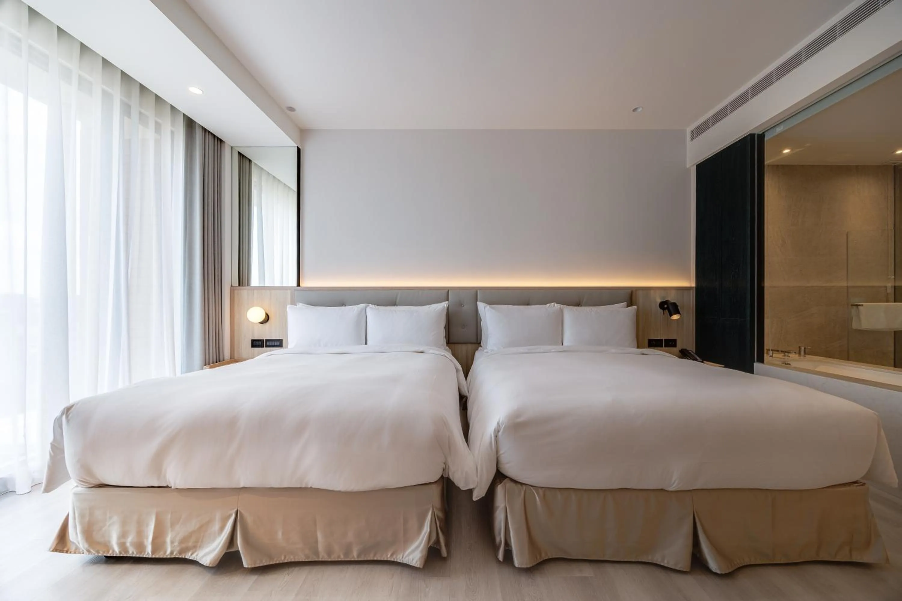 Bed in Boutech Wuri Village Hotel