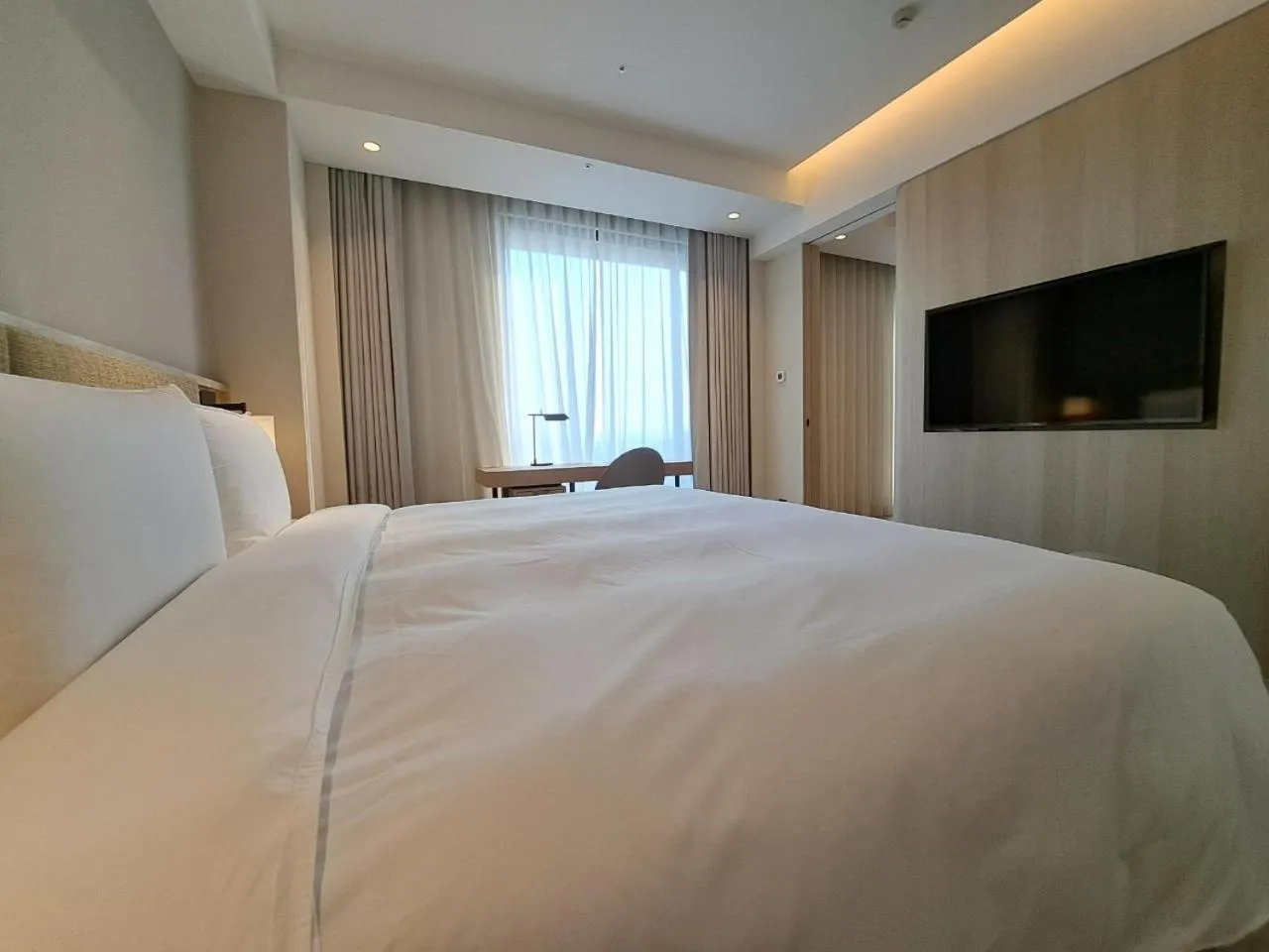 Bed in Boutech Wuri Village Hotel