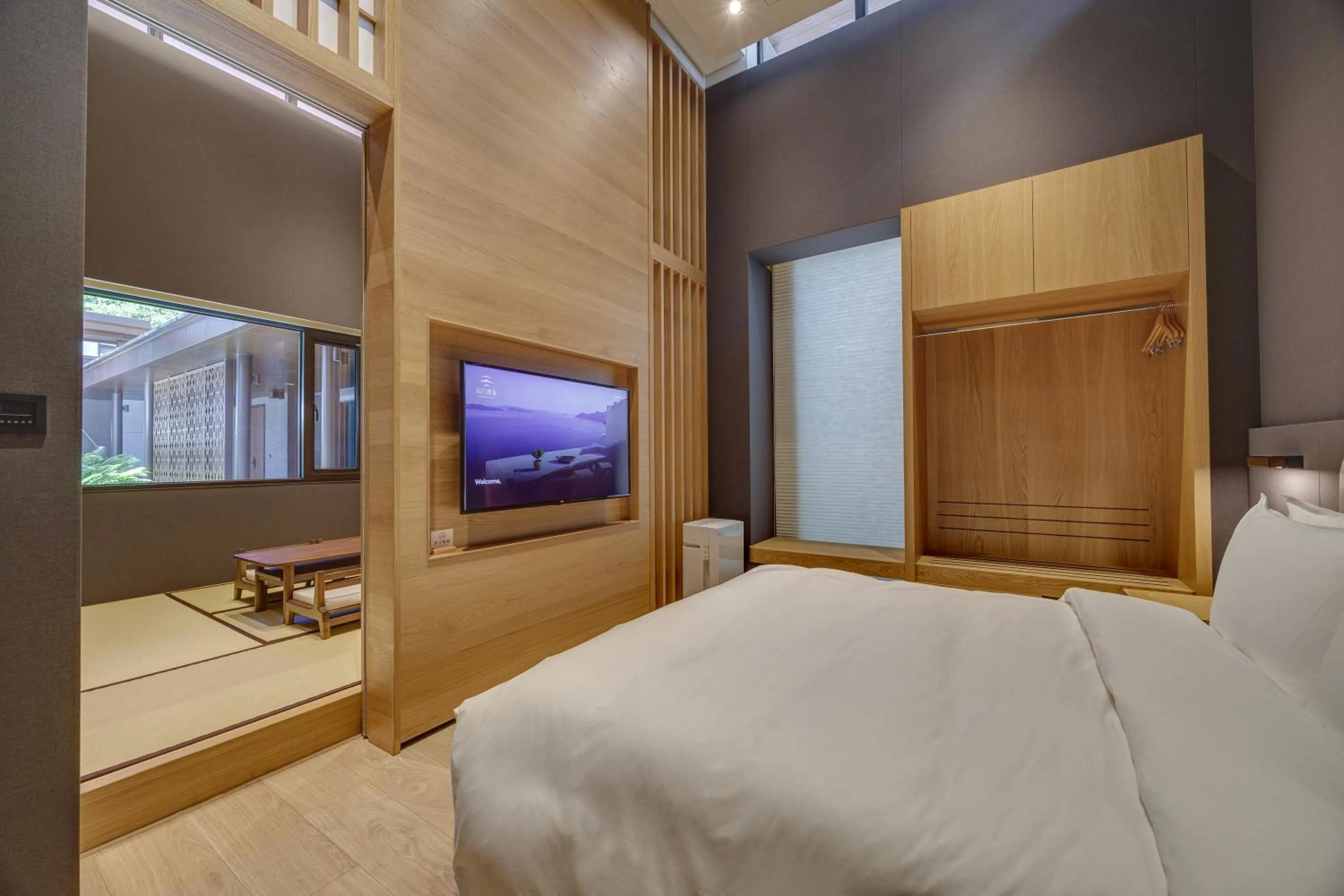 Bed in Boutech Wuri Village Hotel