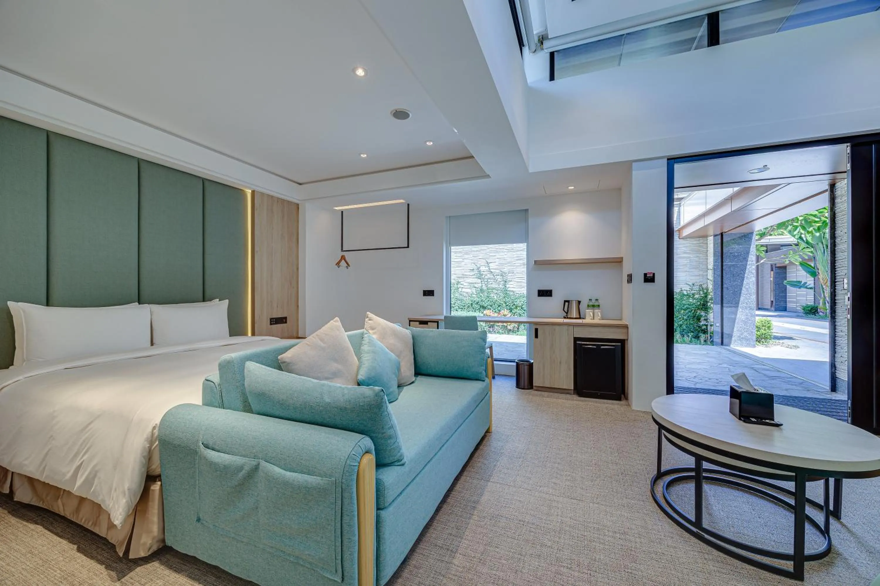 Bed in Boutech Wuri Village Hotel